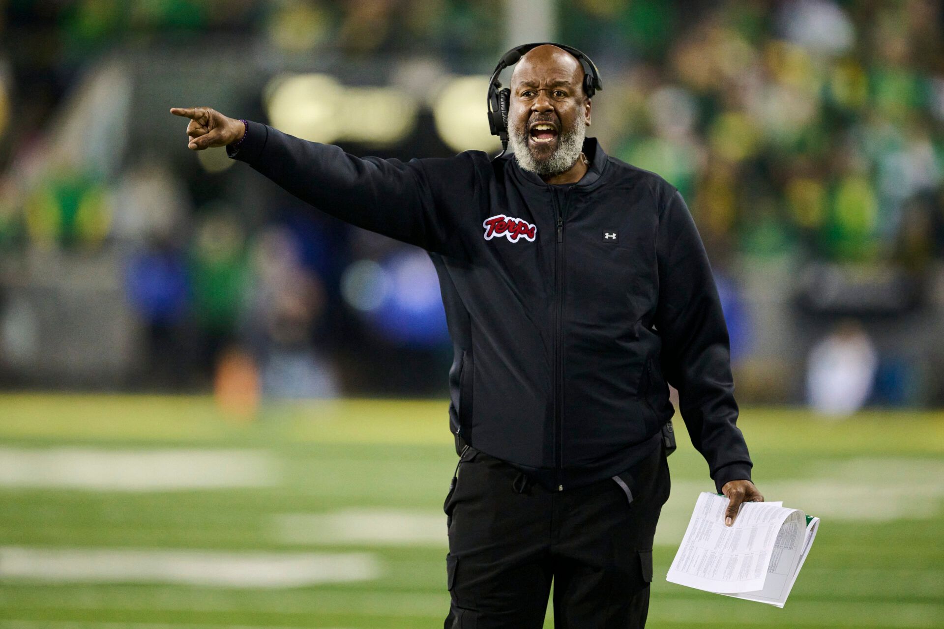 Maryland Terrapins head coach Mike Locksley questions a call during the second half against the Oregon Ducks at Autzen Stadium.
