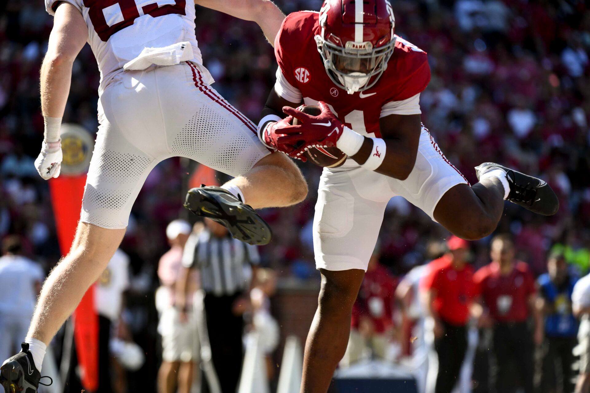 Alabama defensive back Dre Kirkpatrick Jr. (21) intercepts a pass intended for Alabama tight end Ty Lockwood (89) at Bryant-Denny Stadium.