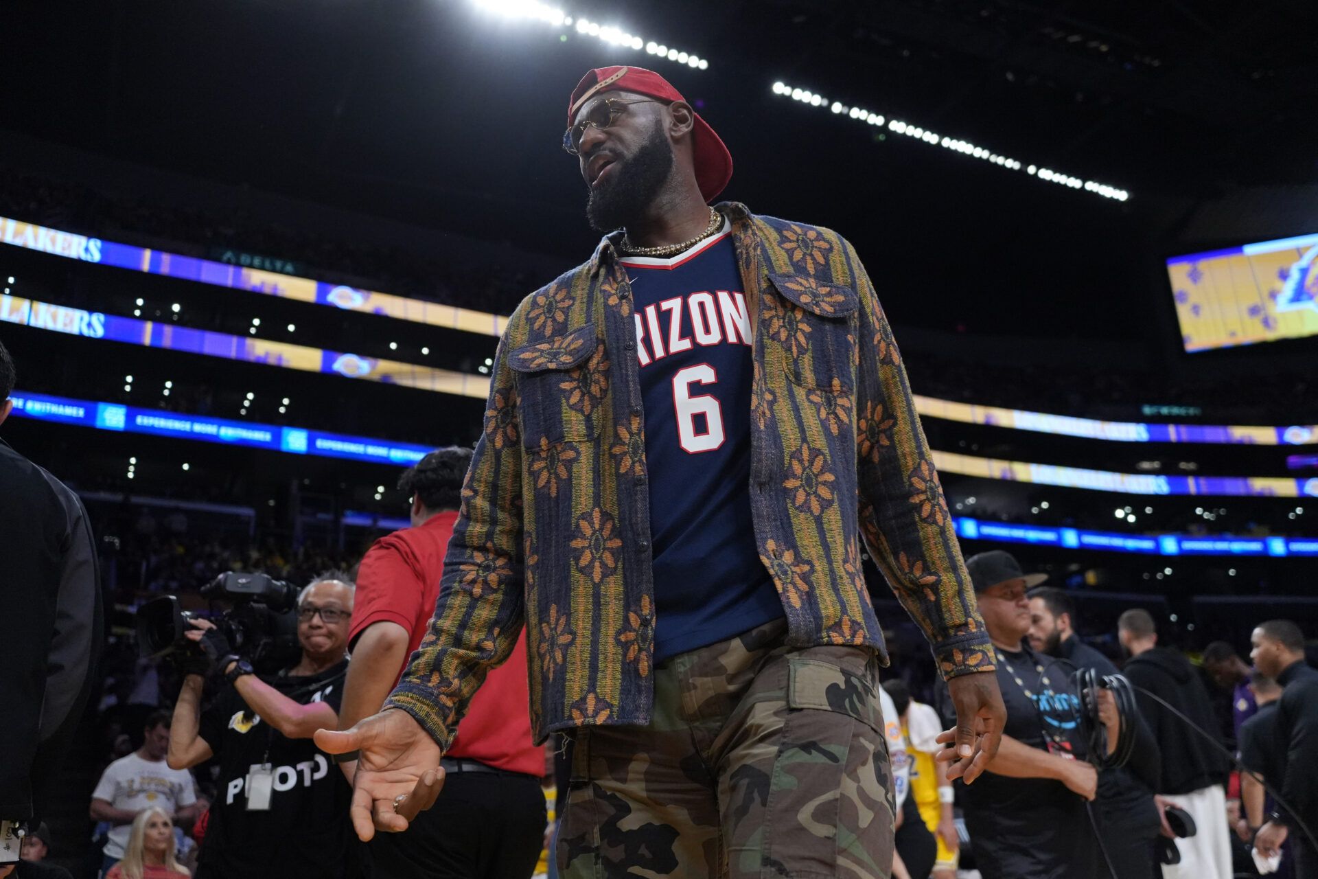 Los Angeles Lakers forward LeBron James poses in the Arizona Wildcats jersey of his son Bryce James (6) during the game against the Minnesota Timberwolves at Crypto.com Arena.