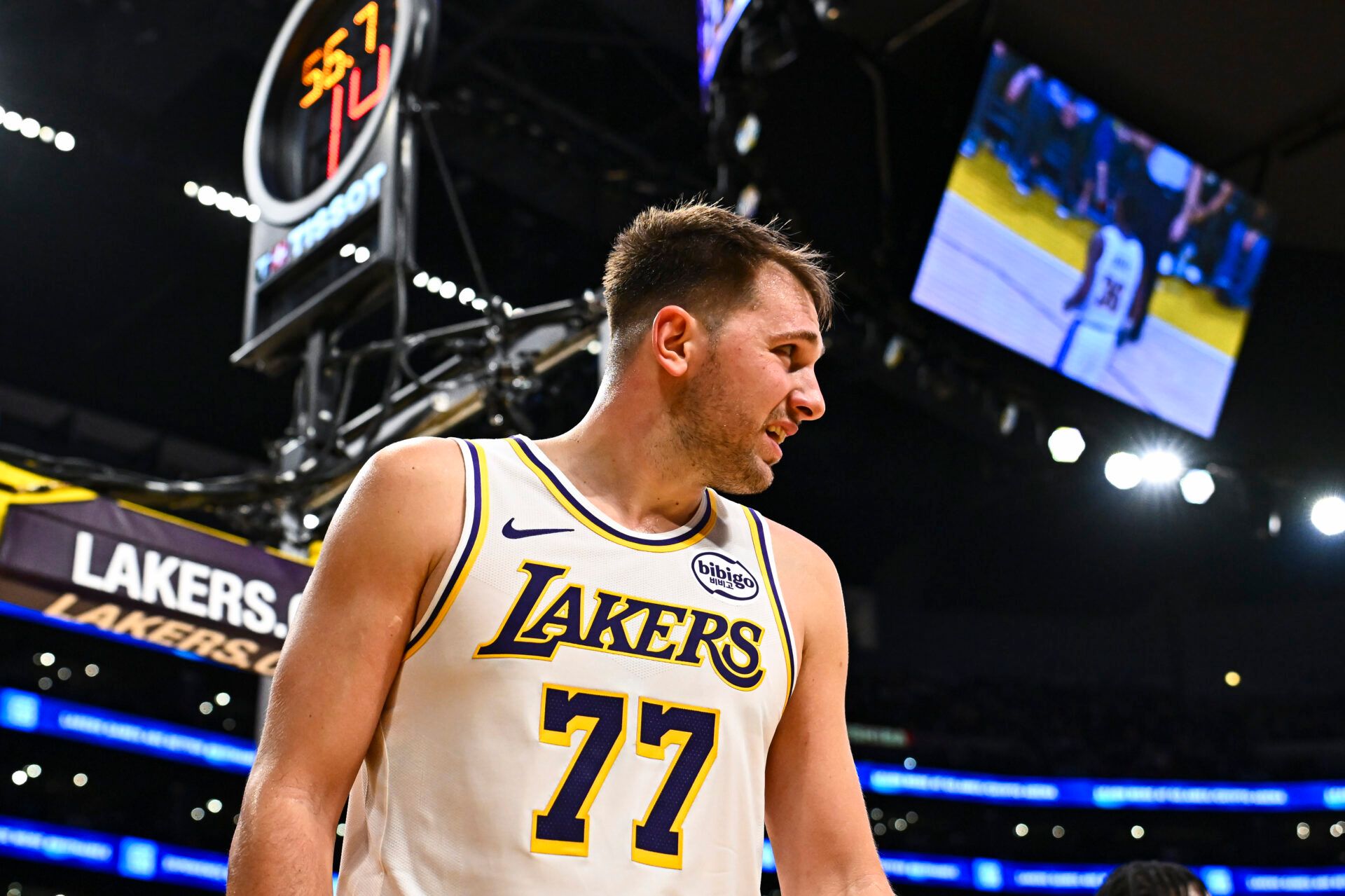 Los Angeles Lakers guard Luka Doncic (77) on the sidelines during the game against the Miami Heat during the second half at Crypto.com Arena.