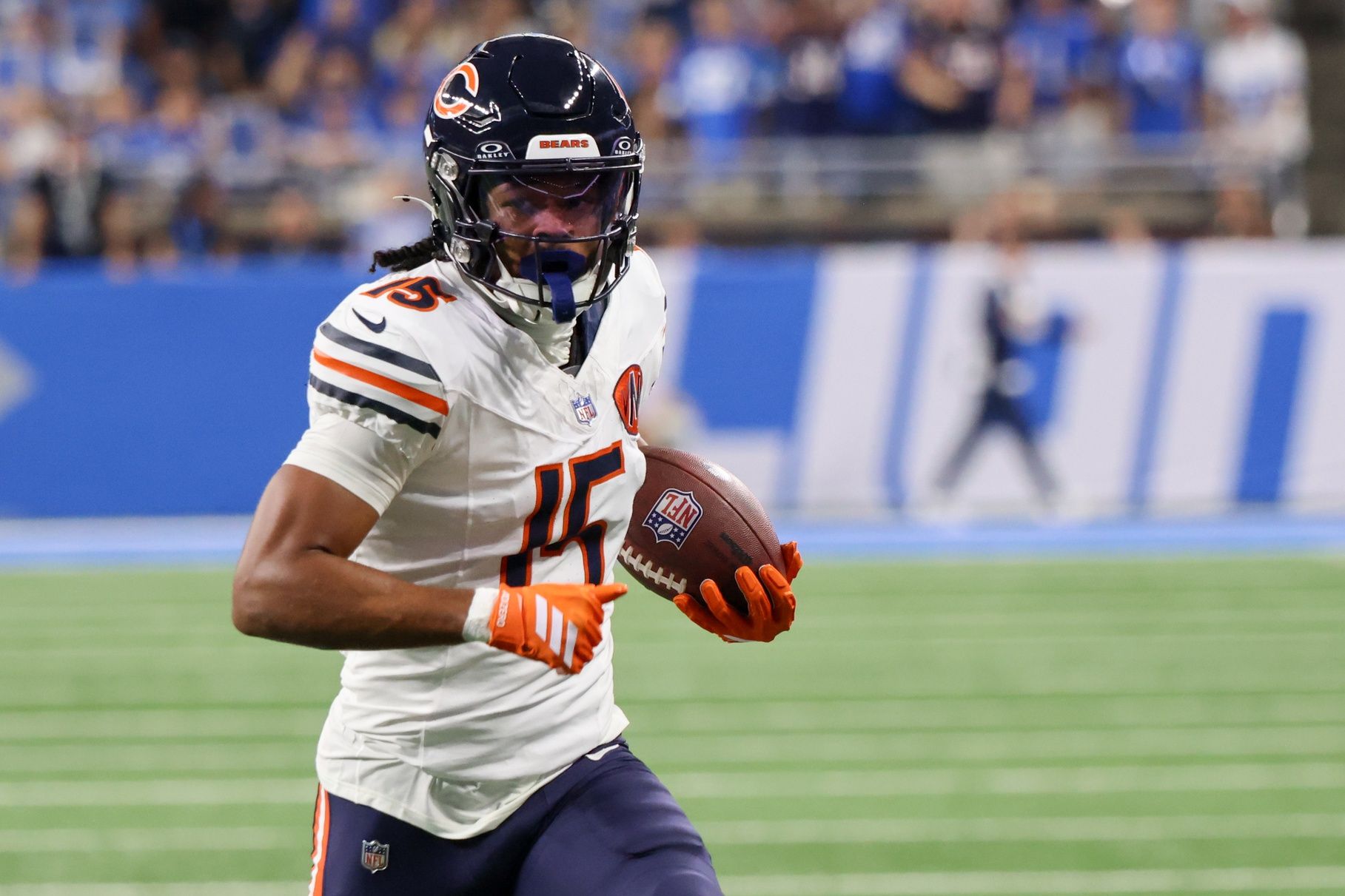 Chicago Bears wide receiver Rome Odunze (15) carries the ball for a touchdown against the Detroit Lions during the first quarter at Ford Field.