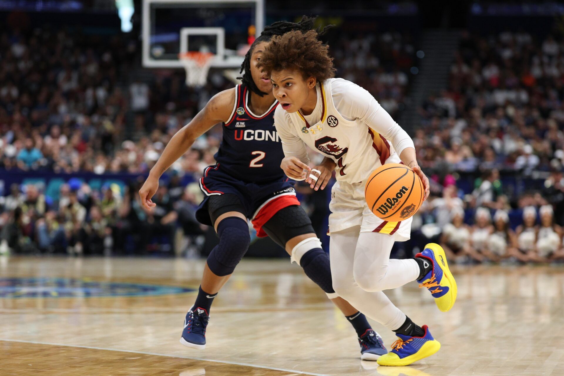 South Carolina Gamecocks guard Maddy McDaniel (1) drives to the basket against Connecticut Huskies guard KK Arnold (2) during the second half of the national championship of the women's 2025 NCAA tournament at Amalie Arena.