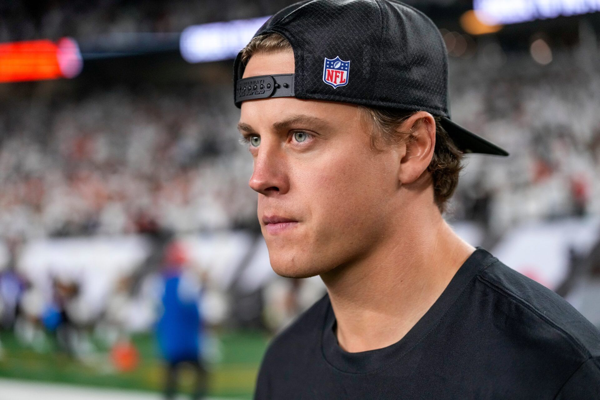 Injured Cincinnati Bengals quarterback Joe Burrow (9) walks on the field after the fourth quarter of the NFL Week 7 game between the Cincinnati Bengals and the Pittsburgh Steelers at Paycor Stadium in downtown Cincinnati on Thursday, Oct. 16, 2025. The Bengals won, 33-31.
