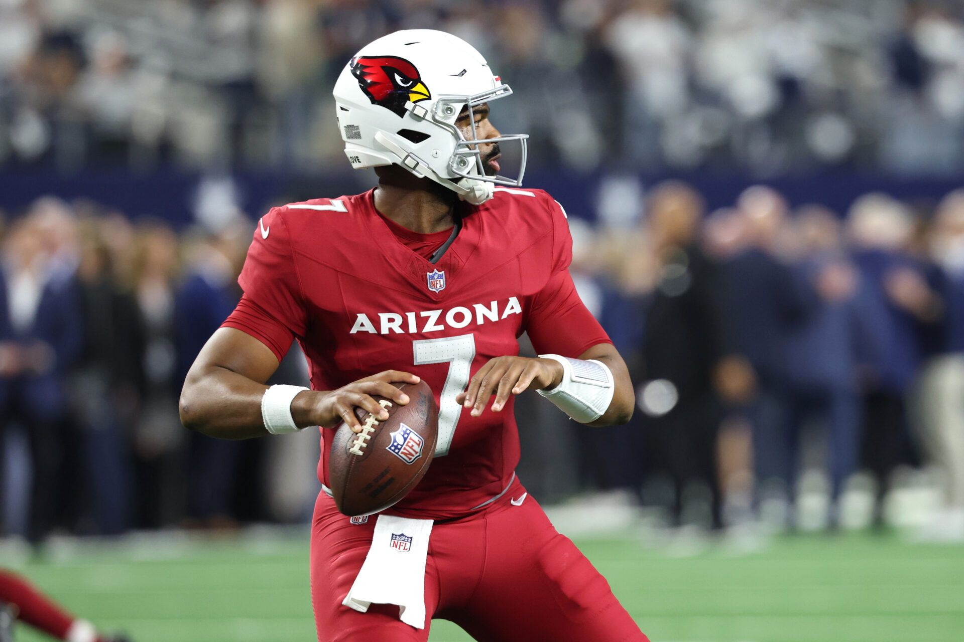 Arizona Cardinals quarterback Jacoby Brissett (7) warms up before the game against the Dallas Cowboys at AT&T Stadium.