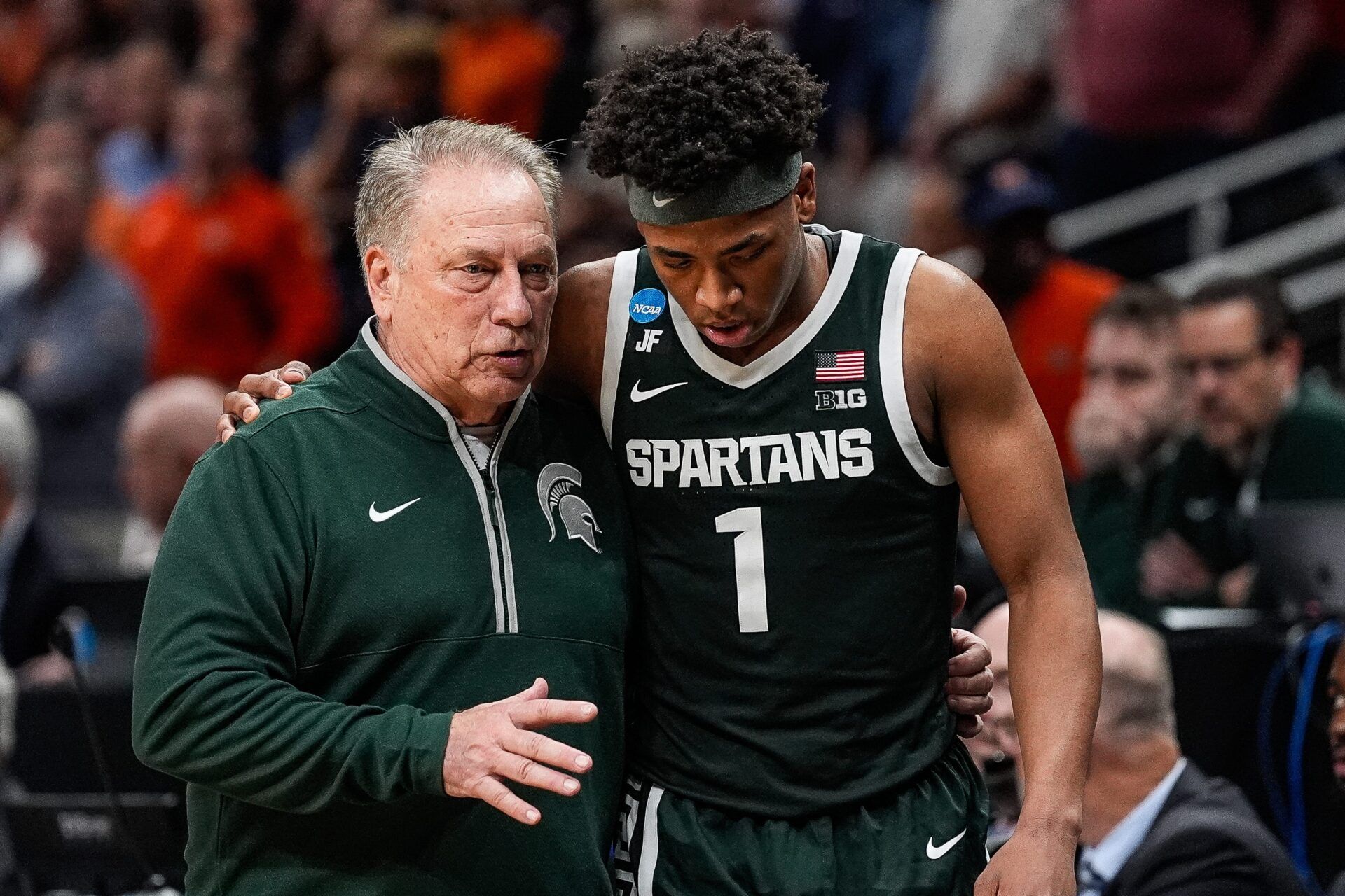 Michigan State head coach Tom Izzo talks to guard Jeremy Fears Jr. (1) after a play against Auburn during the second half of the Elite Eight round of NCAA tournament at State Farm Arena in Atlanta, Ga. on Sunday, March 30, 2025.