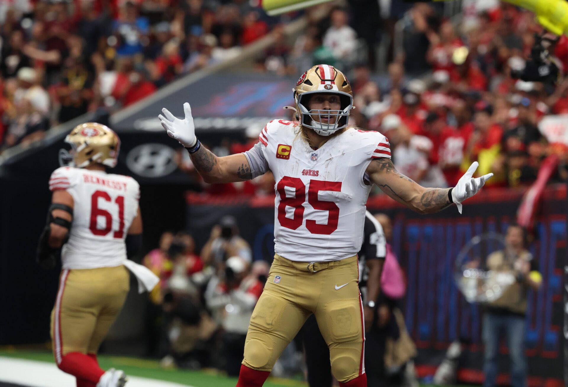 San Francisco 49ers tight end George Kittle (85) celebrates a touchdown during the second quarter against the Houston Texans at NRG Stadium.