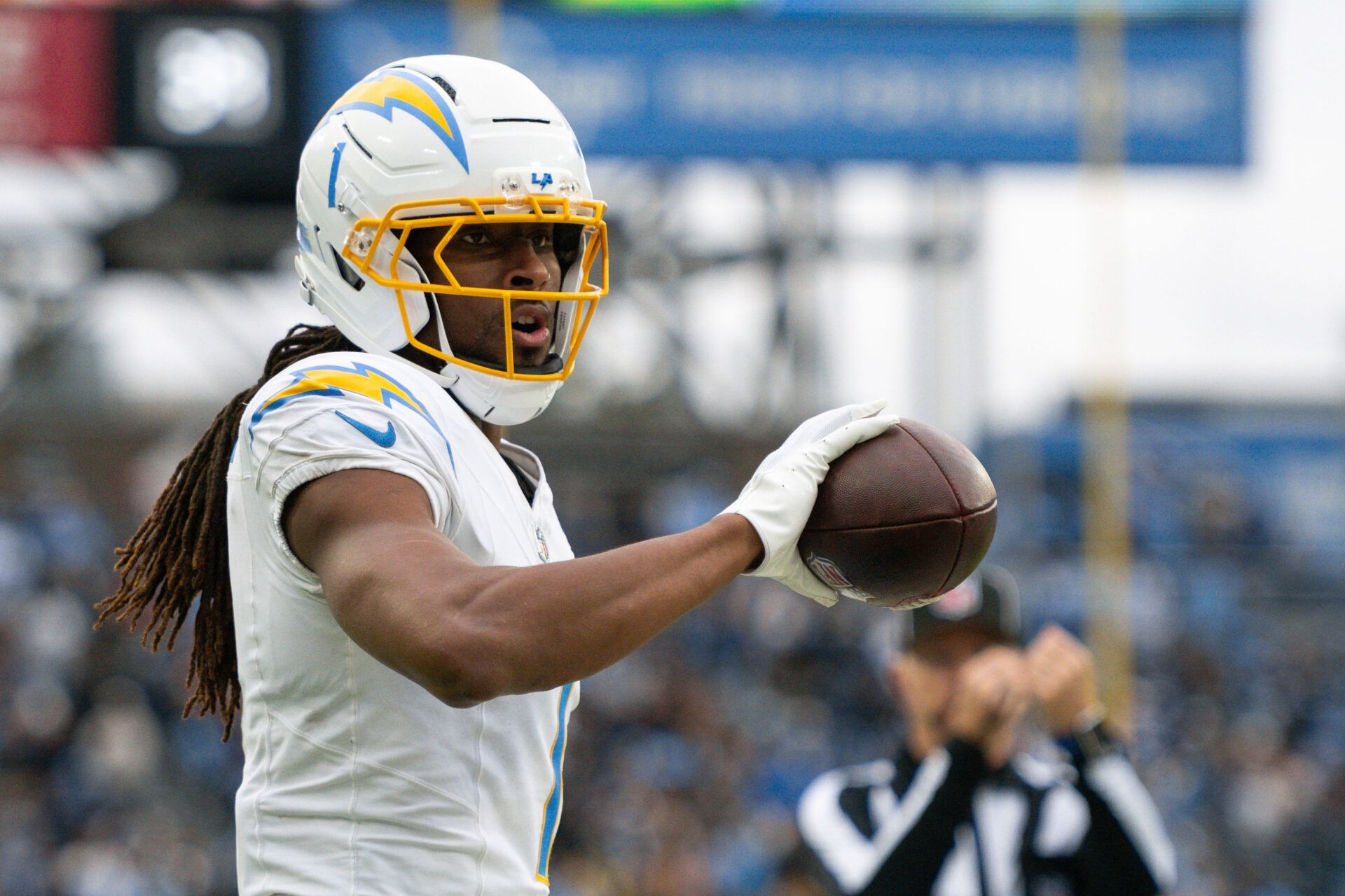 Los Angeles Chargers wide receiver Quentin Johnston (1) celebrates the first down catch against the Tennessee Titans during the first half at Nissan Stadium.