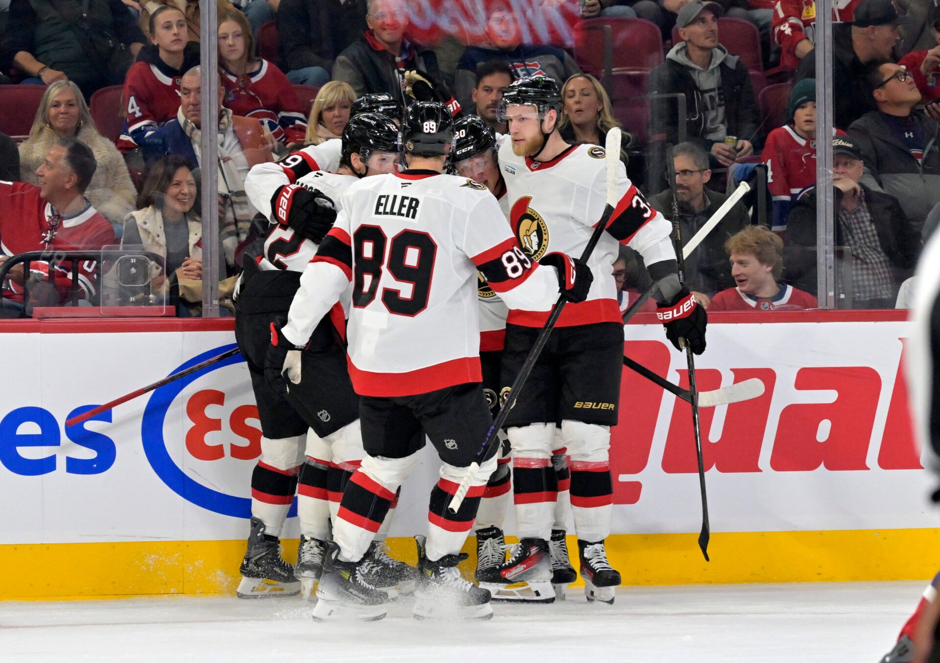 Ottawa Senators forward Drake Batherson (19) celebrates with teammates after scoring a goal against the Montreal Canadiens during the second period at the Bell Centre.