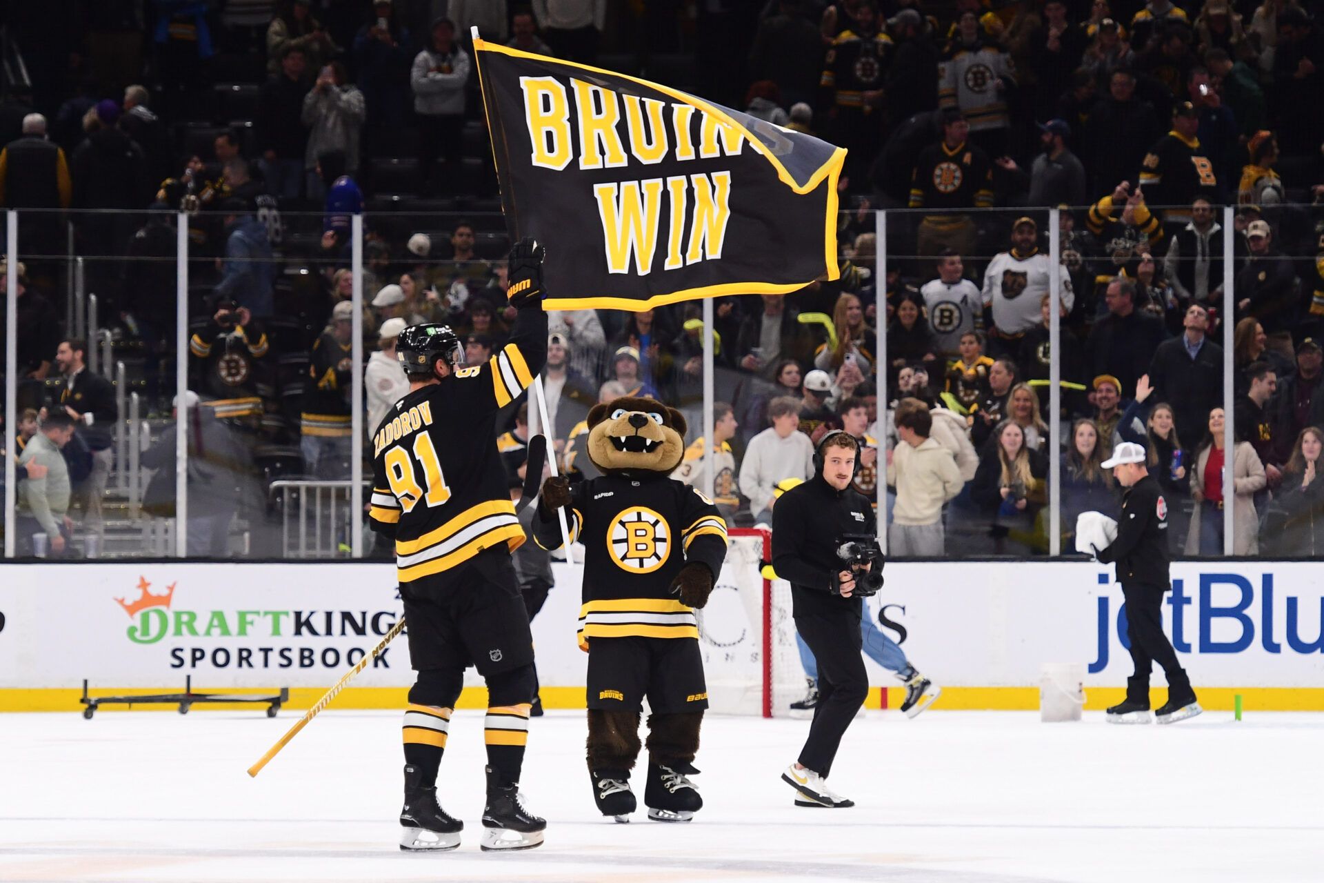 Boston Bruins defenseman Nikita Zadorov (91) reacts after defeating the Buffalo Sabres in overtime at TD Garden.