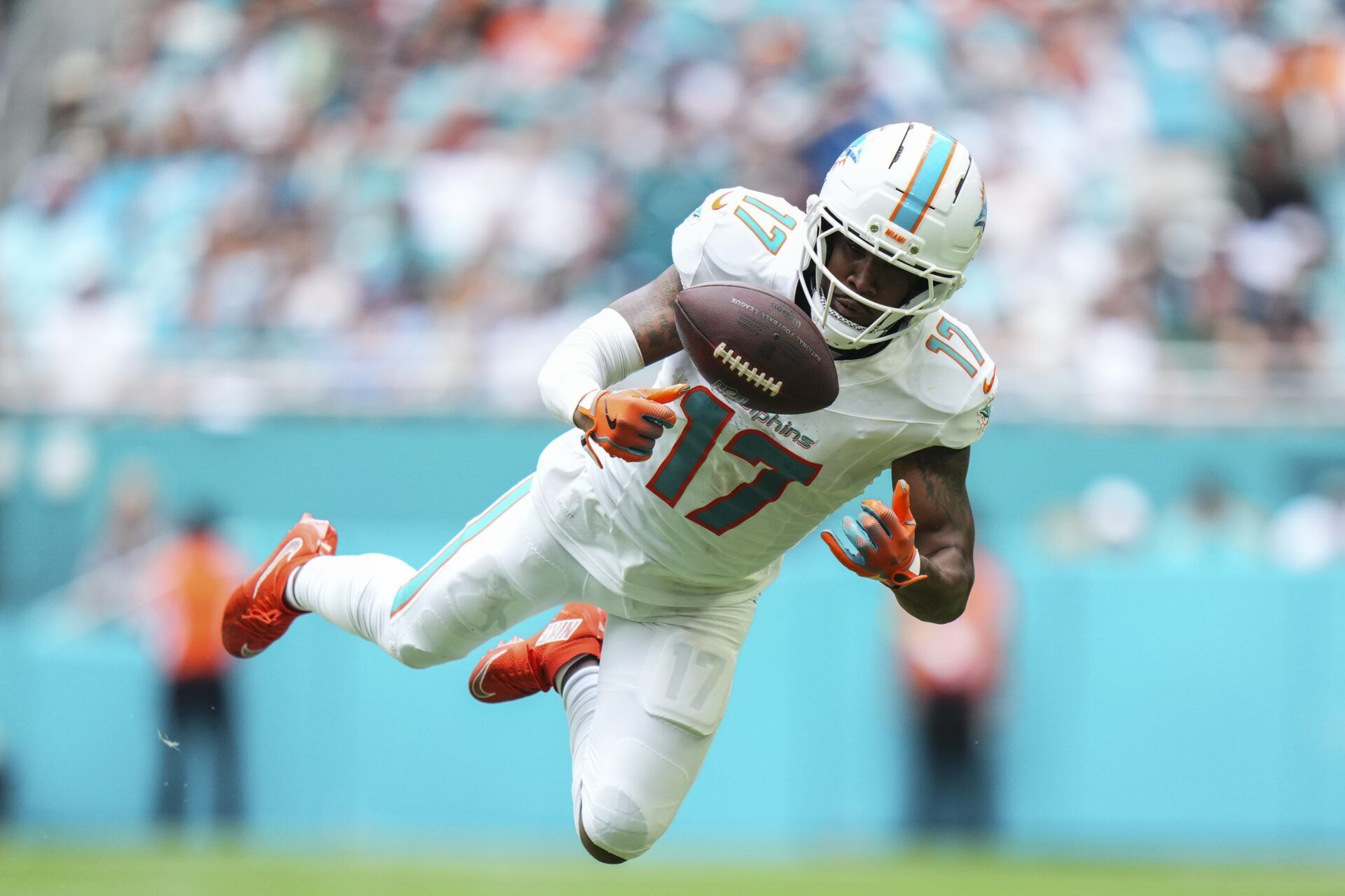 Miami Dolphins wide receiver Jaylen Waddle (17) catches a pass against the Los Angeles Chargers during the second quarter at Hard Rock Stadium.