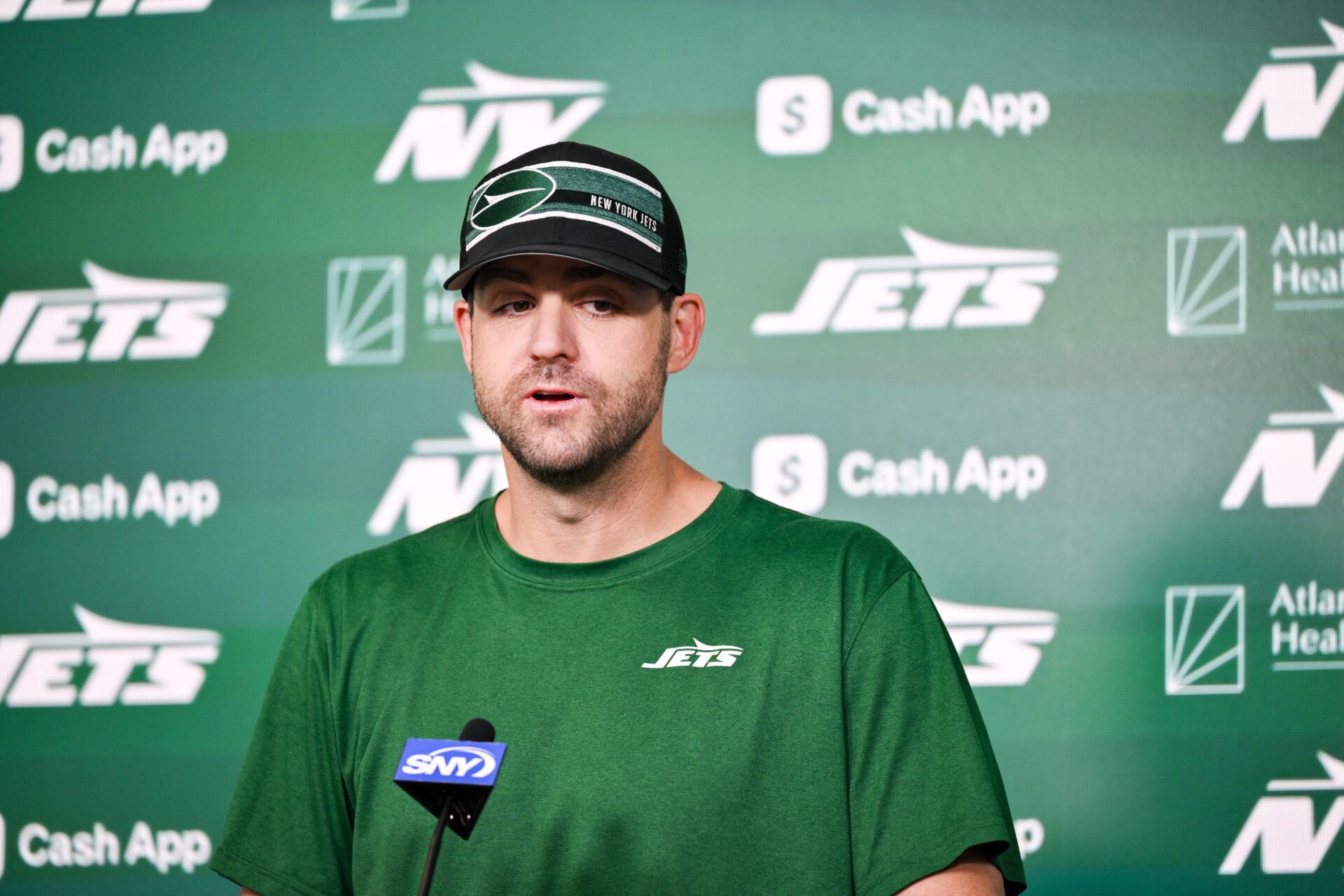 New York Jets offensive coordinator Tanner Engstrand speaks at a press conference during minicamp at Atlantic Health Jets Training Center.