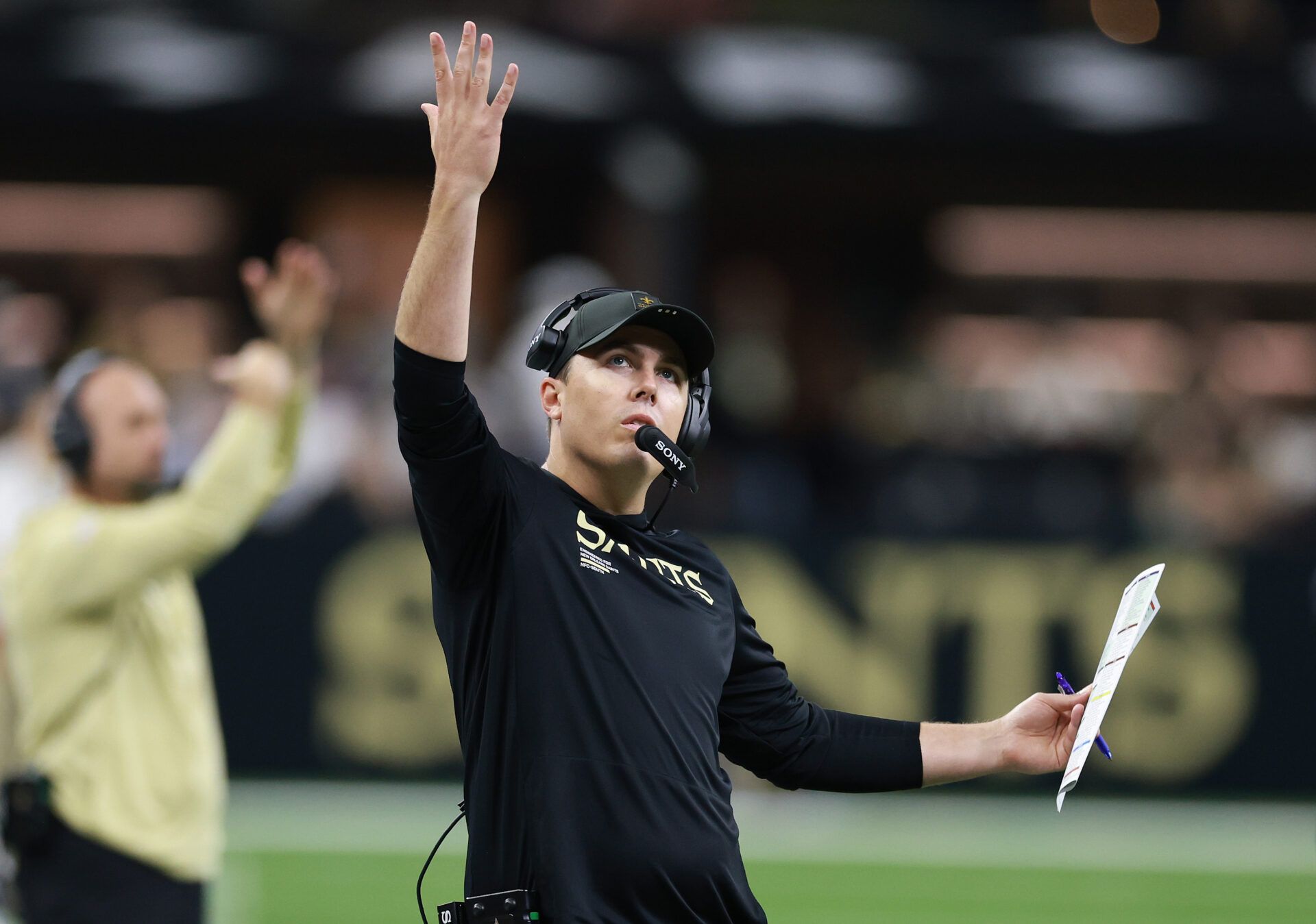 NEW ORLEANS, LOUISIANA - OCTOBER 12: Head coach Kellen Moore of the New Orleans Saints reacts during the NFL 2025 game against the New England Patriots at Caesars Superdome on October 12, 2025 in New Orleans, Louisiana.