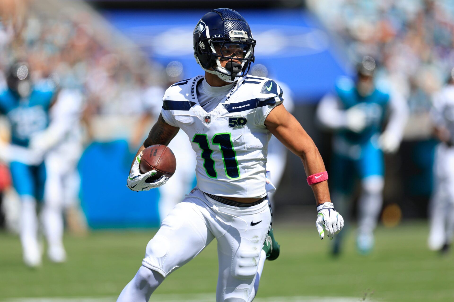 Seattle Seahawks wide receiver Jaxon Smith-Njigba (11) rushes for yards during the second quarter of an NFL football matchup, Sunday, Oct. 12, 2025, at EverBank Stadium in Jacksonville, Fla. The Seahawks defeated the Jaguars 20-12.
