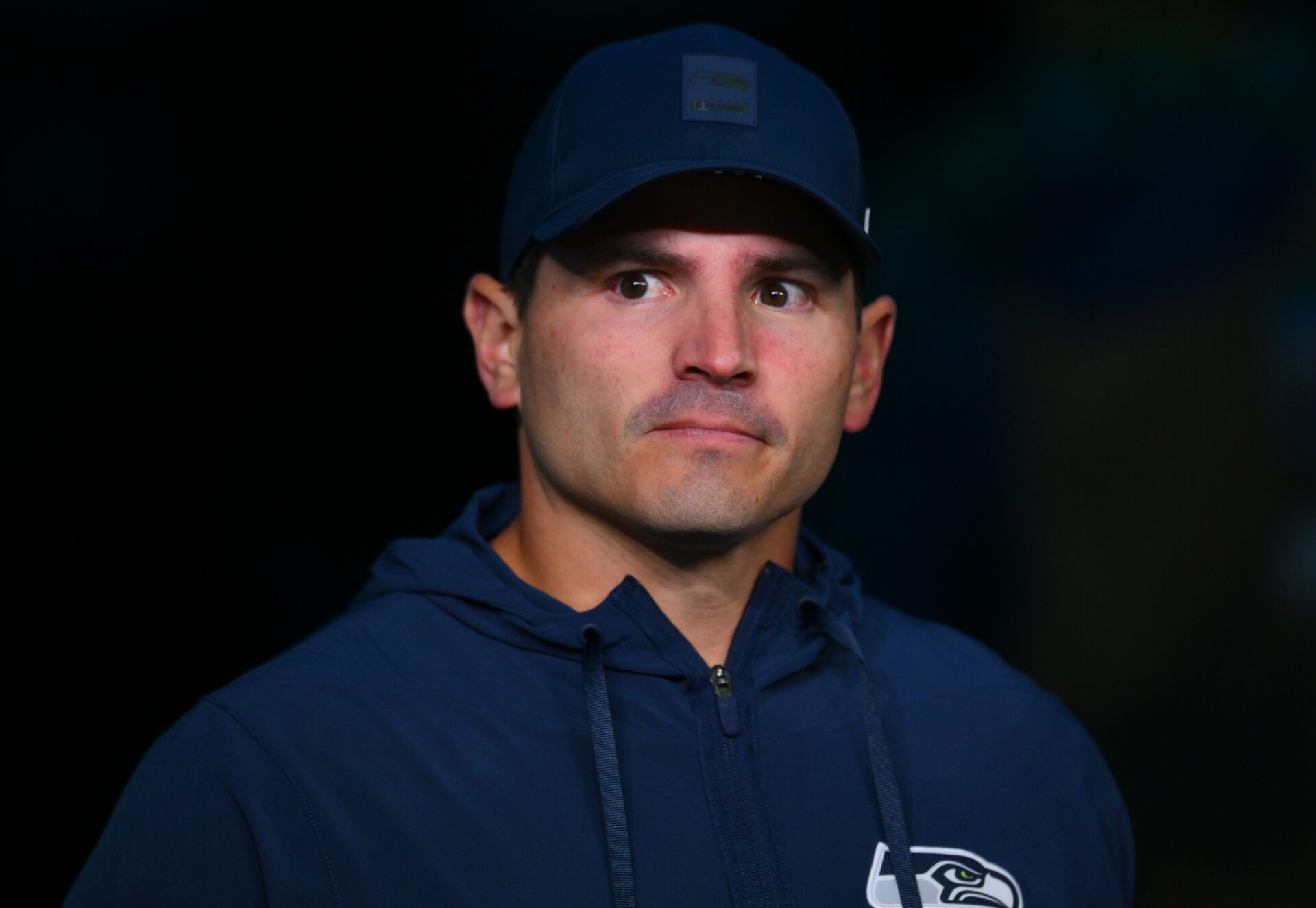 Seattle Seahawks head coach Mike Macdonald walks onto the field prior to the game against the Houston Texans at Lumen Field.