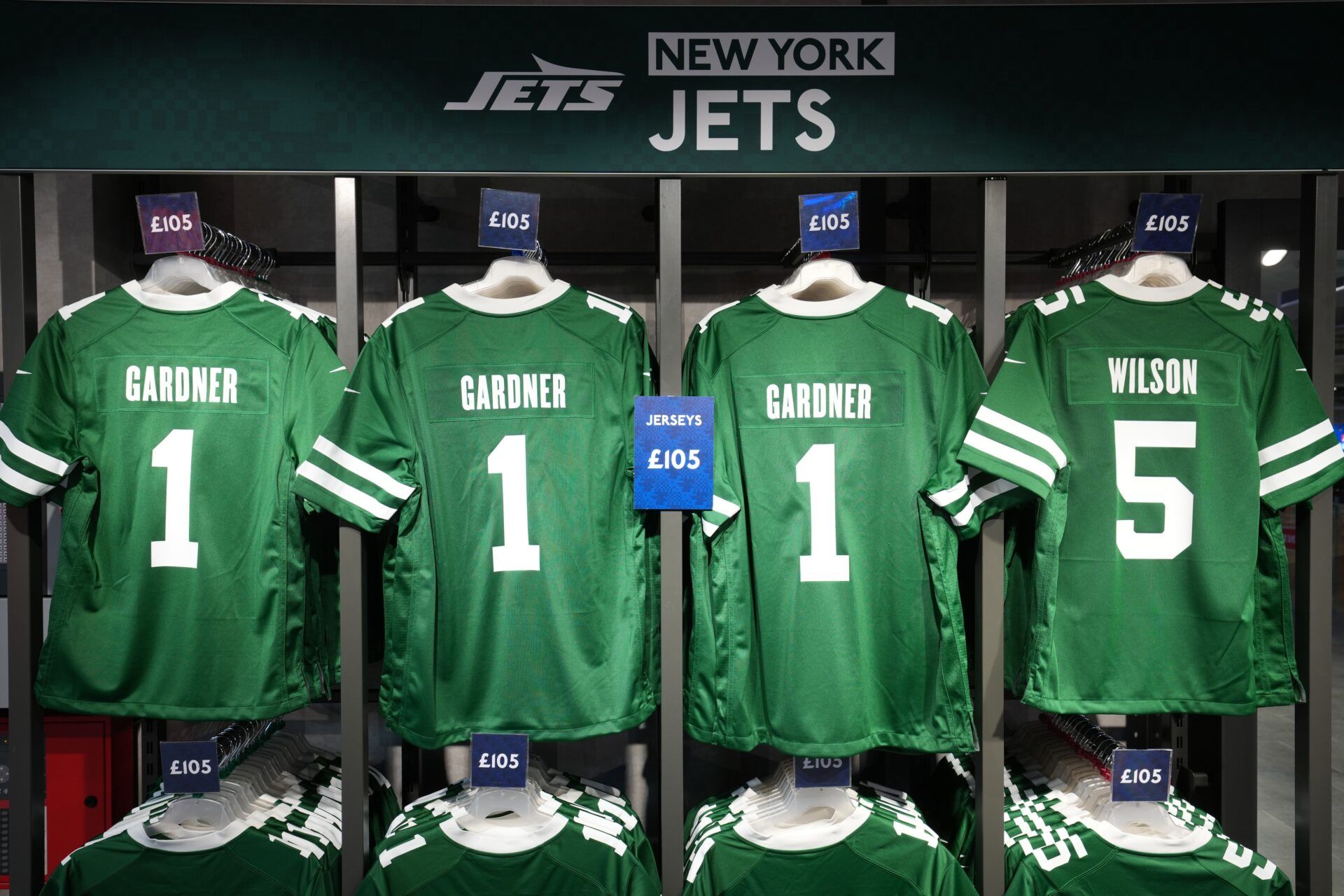 Nike jerseys of New York Jets cornerback Sauce Gardner (1) and wide receiver Garrett Wilson (5) at the NFL Shop at Tottenham Hotspur Stadium.