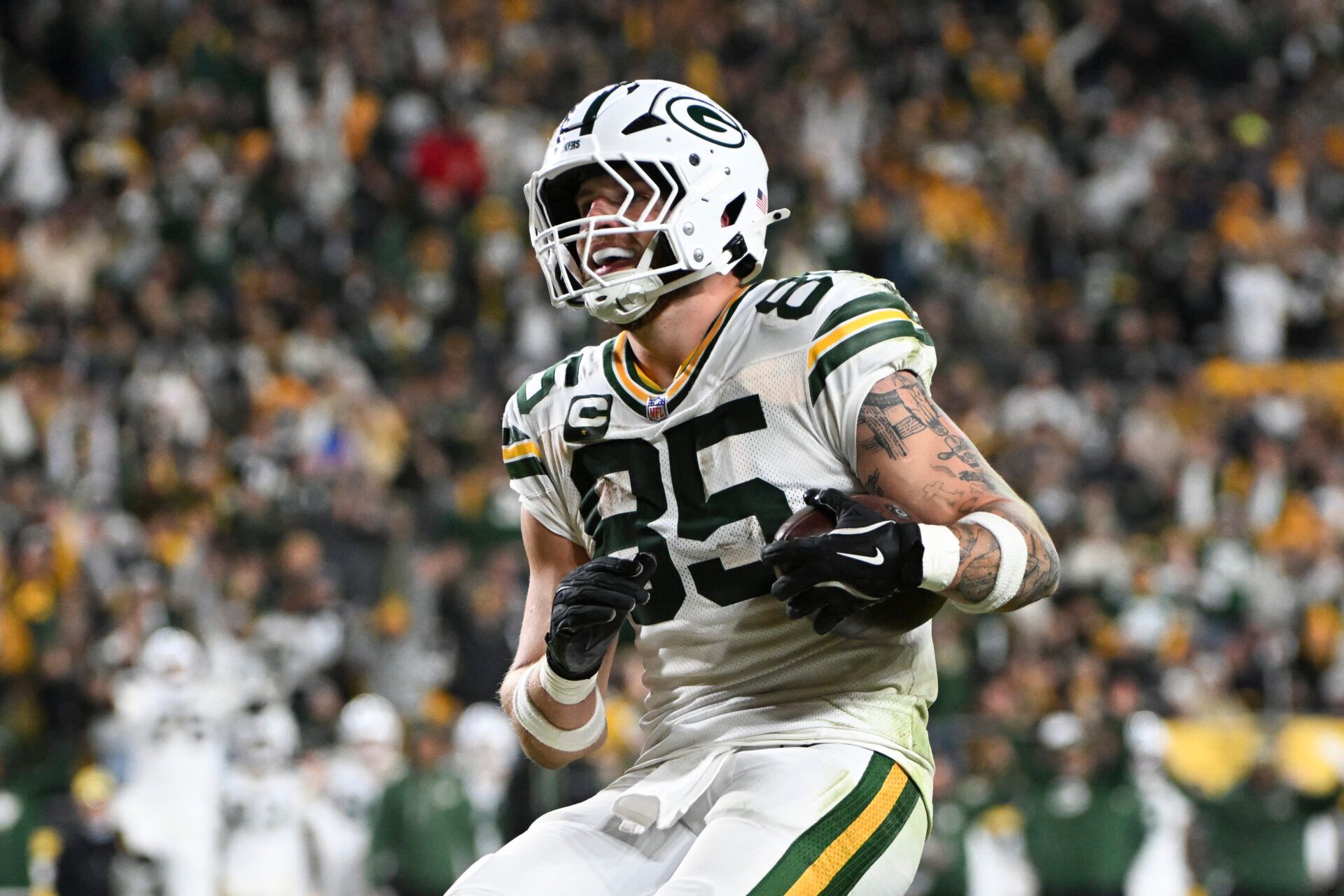 Green Bay Packers tight end Tucker Kraft (85) celebrates his touchdown against the Pittsburgh Steelers during the fourth quarter at Acrisure Stadium.