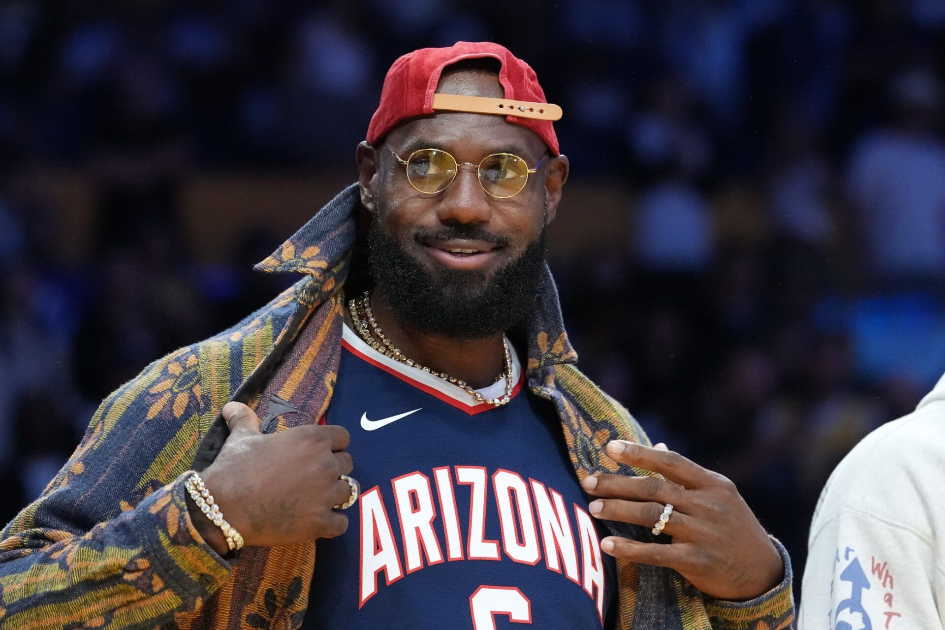 Los Angeles Lakers forward LeBron James poses in the Arizona Wildcats jersey of his son Bryce James (6) during the game against the Minnesota Timberwolves at Crypto.com Arena.