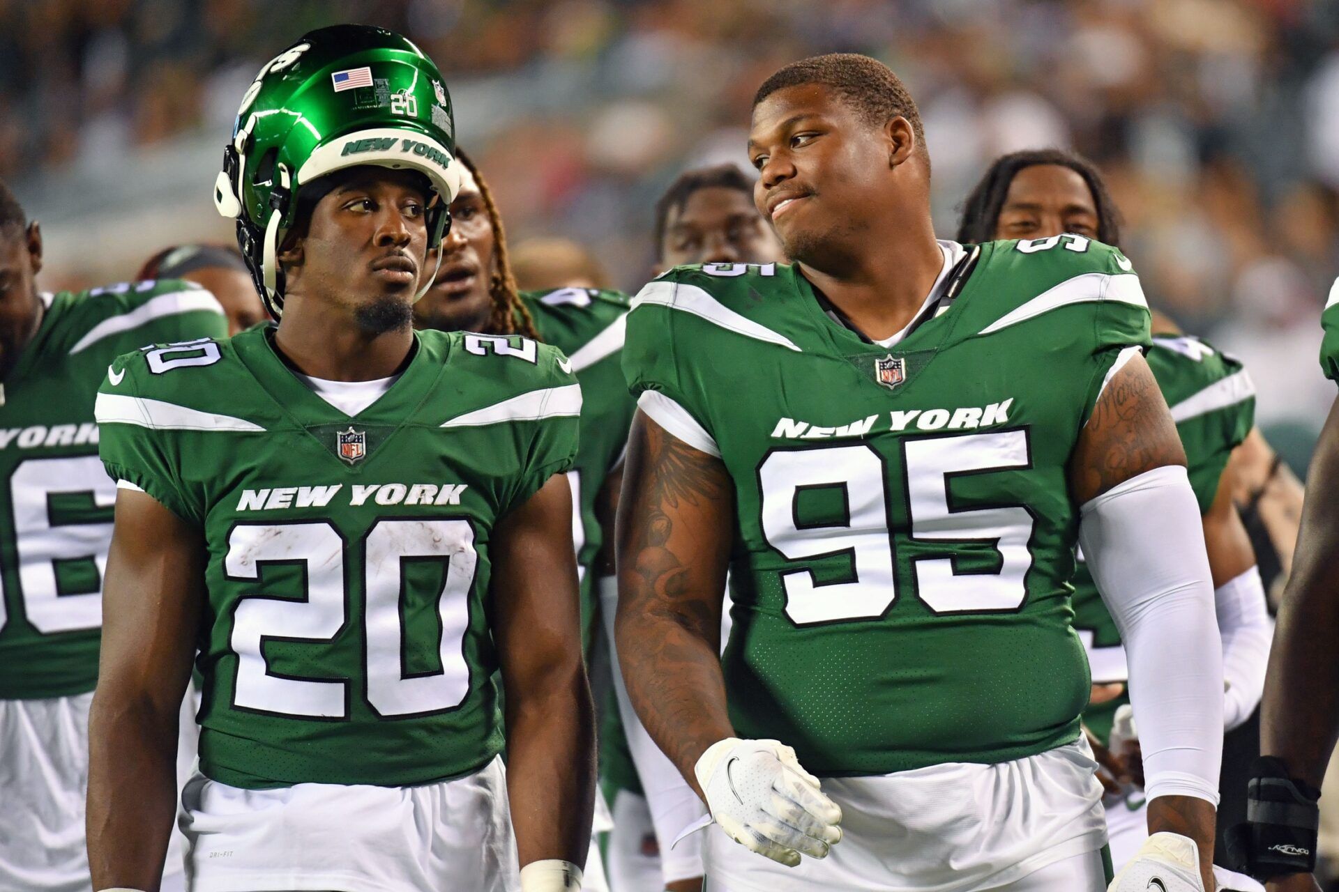 New York Jets running back Breece Hall (20) and New York Jets defensive lineman Quinnen Williams (95) against the Philadelphia Eagles at Lincoln Financial Field.