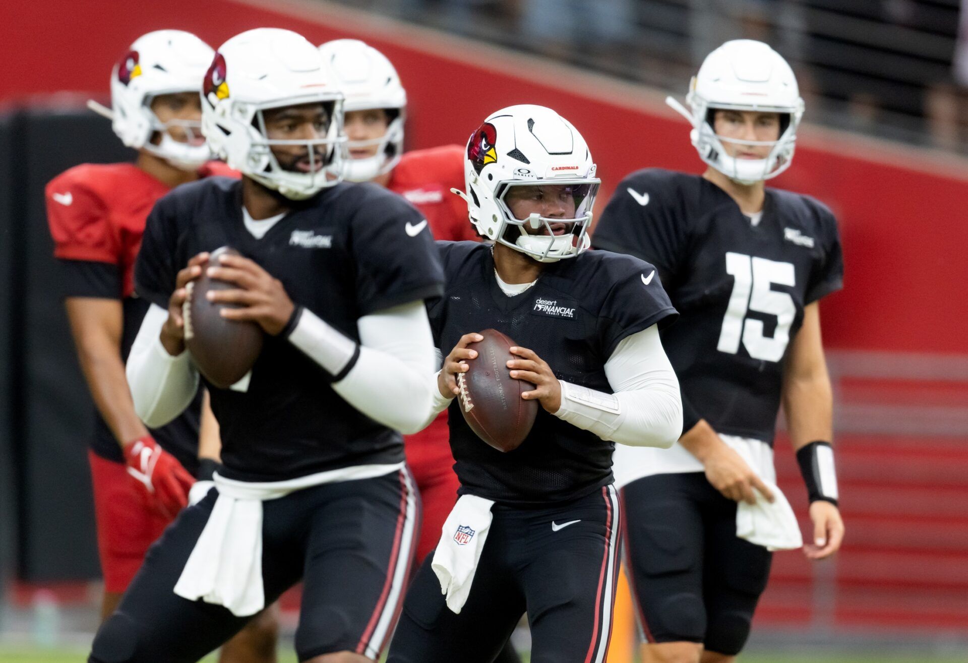 Arizona Cardinals quarterback Kyler Murray (1), Jacoby Brissett (7) and Clayton Tune (15) during the Red and White practice in training camp at State Farm Stadium.