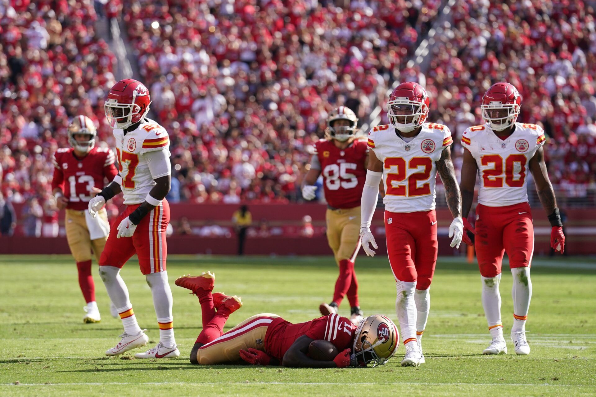 San Francisco 49ers wide receiver Brandon Aiyuk (11) lays on the ground after suffering an injury against the Kansas City Chiefs in the second quarter at Levi's Stadium.
