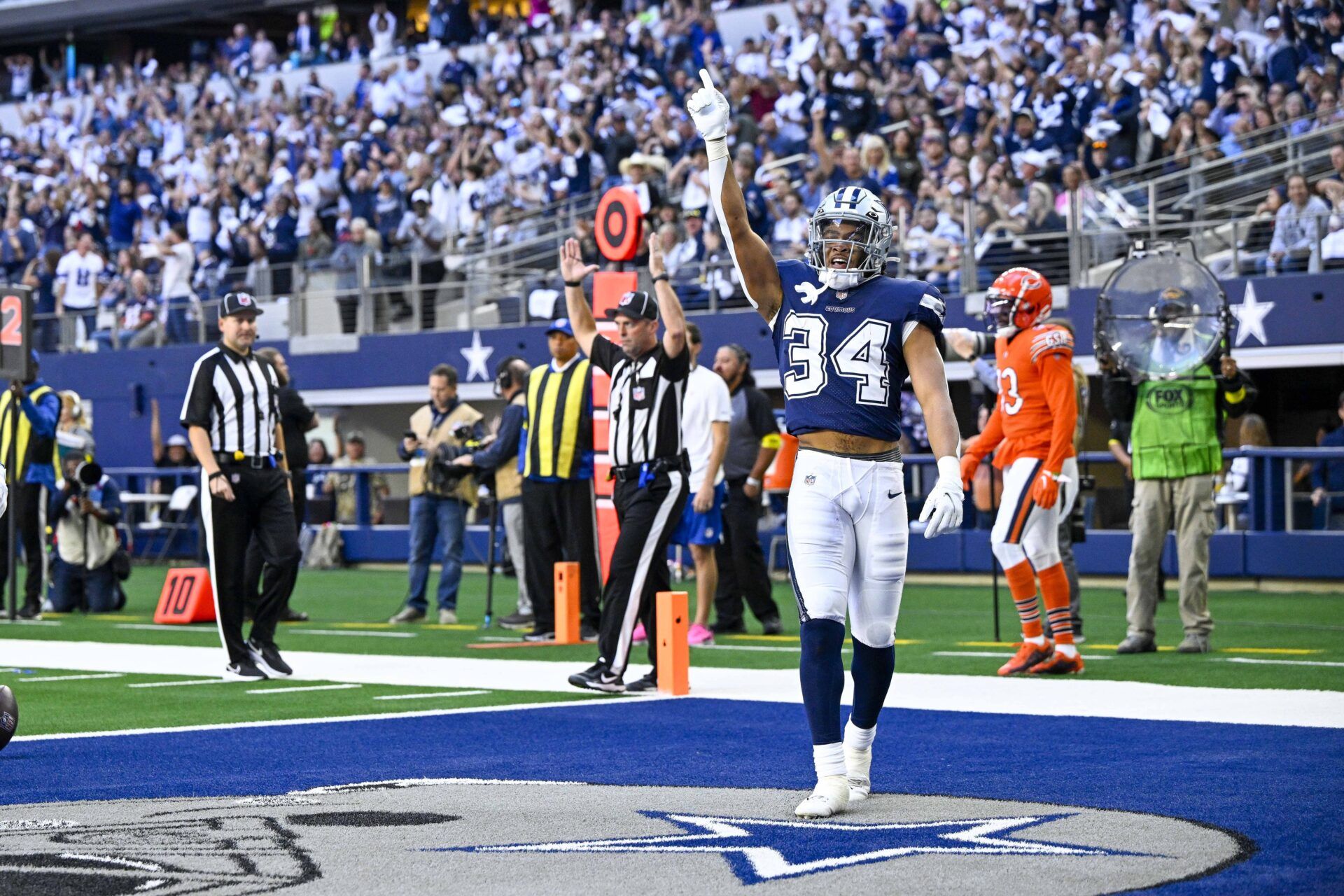 Dallas Cowboys running back Malik Davis (34) celebrates during the game between the Dallas Cowboys and the Chicago Bears at AT&T Stadium.