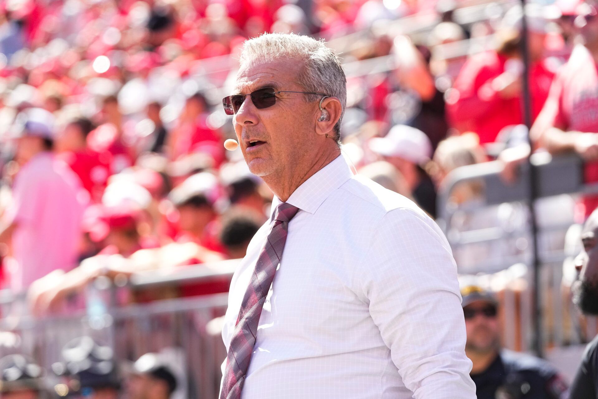 Former Ohio State Buckeyes head coach Urban Meyer, now with Fox Sports, watches on the sideline during the NCAA football game against the Texas Longhorns at Ohio Stadium on Aug. 30, 2025.