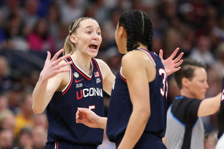 Connecticut Huskies guard Paige Bueckers (5) and guard Azzi Fudd (35) speak during the second half against the South Carolina Gamecocks of the national championship of the women's 2025 NCAA tournament at Amalie Arena.