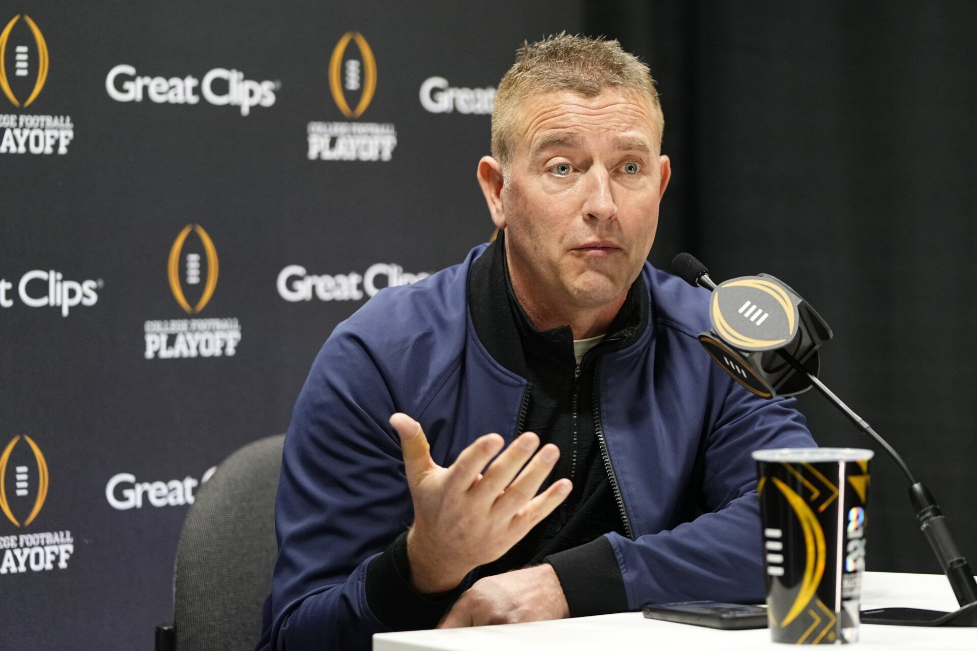 ESPN broadcaster Kirk Herbstreit answers questions during Media Day for the College Football Playoff against the Notre Dame Fighting Irish at the Georgia World Congress Center in Atlanta on Jan. 18, 2025.