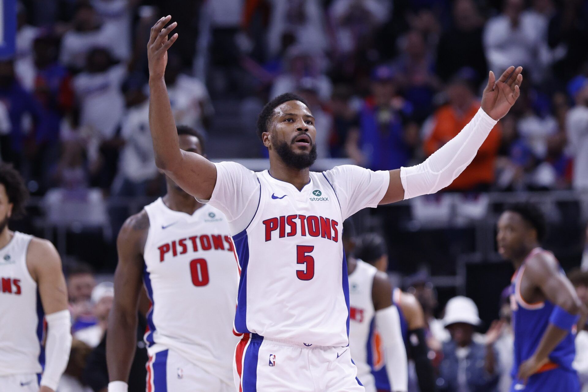 Detroit Pistons guard Malik Beasley (5) fires up the crowd in the first half against the New York Knicks during game six of first round for the 2024 NBA Playoffs at Little Caesars Arena.