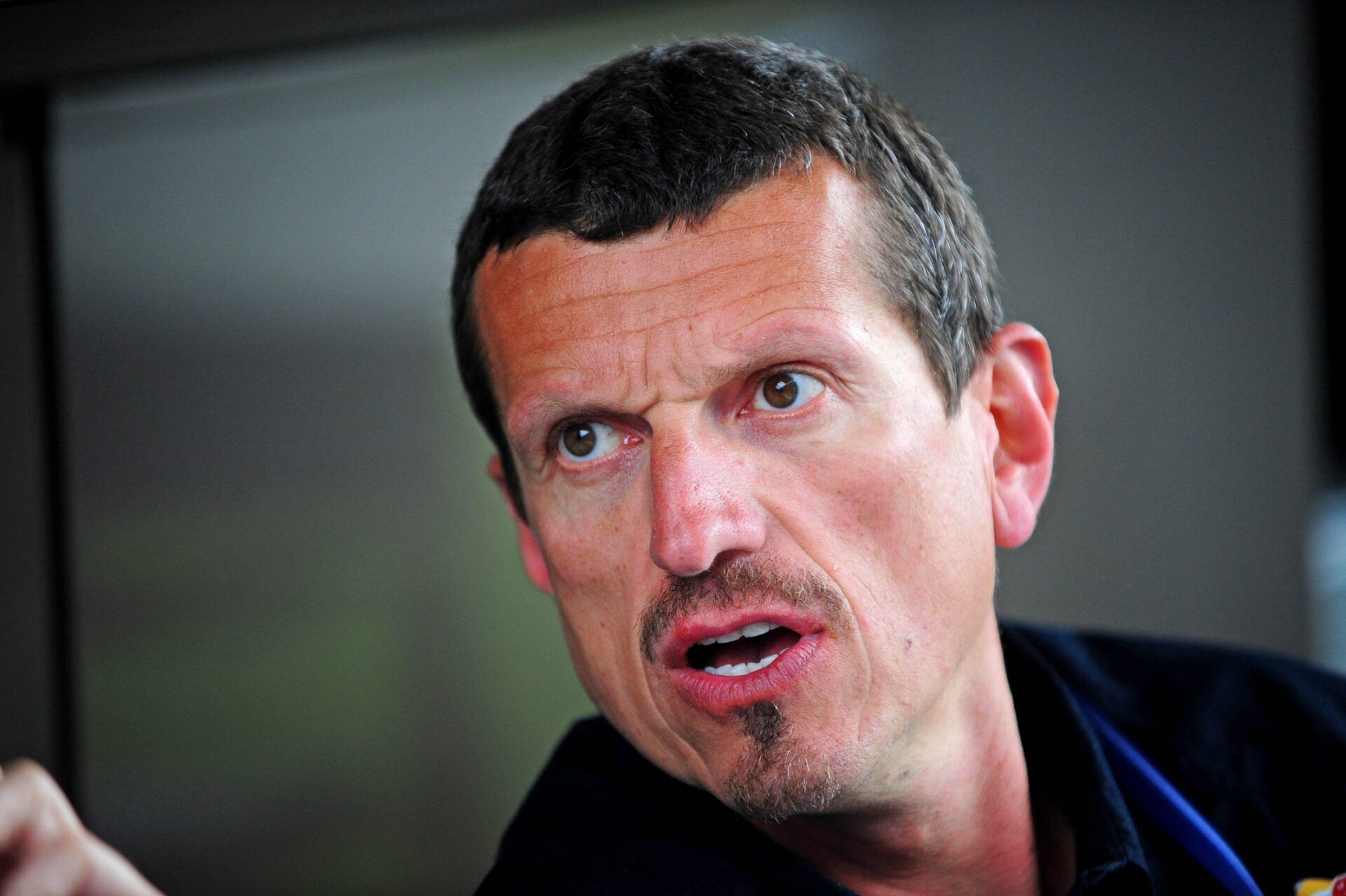 Daytona Beach, FL, USA; Red Bull Racing official Guenther Steiner in the NASCAR Sprint Cup Series garage area during practice for the Daytona 500 at Daytona International Speedway.