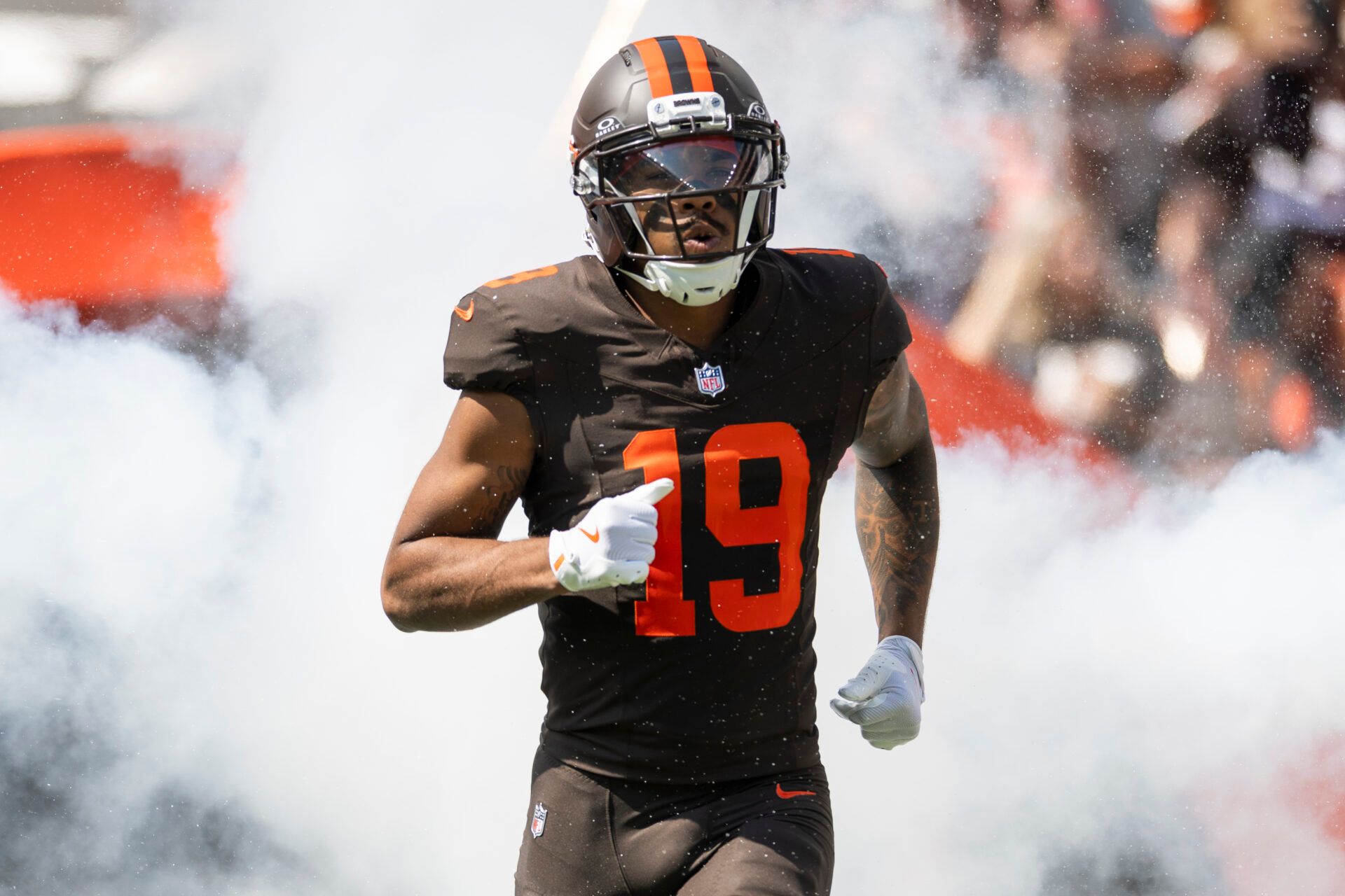 Cleveland Browns wide receiver Cedric Tillman (19) runs onto the field during player introductions before the game against the Green Bay Packers at Huntington Bank Field.