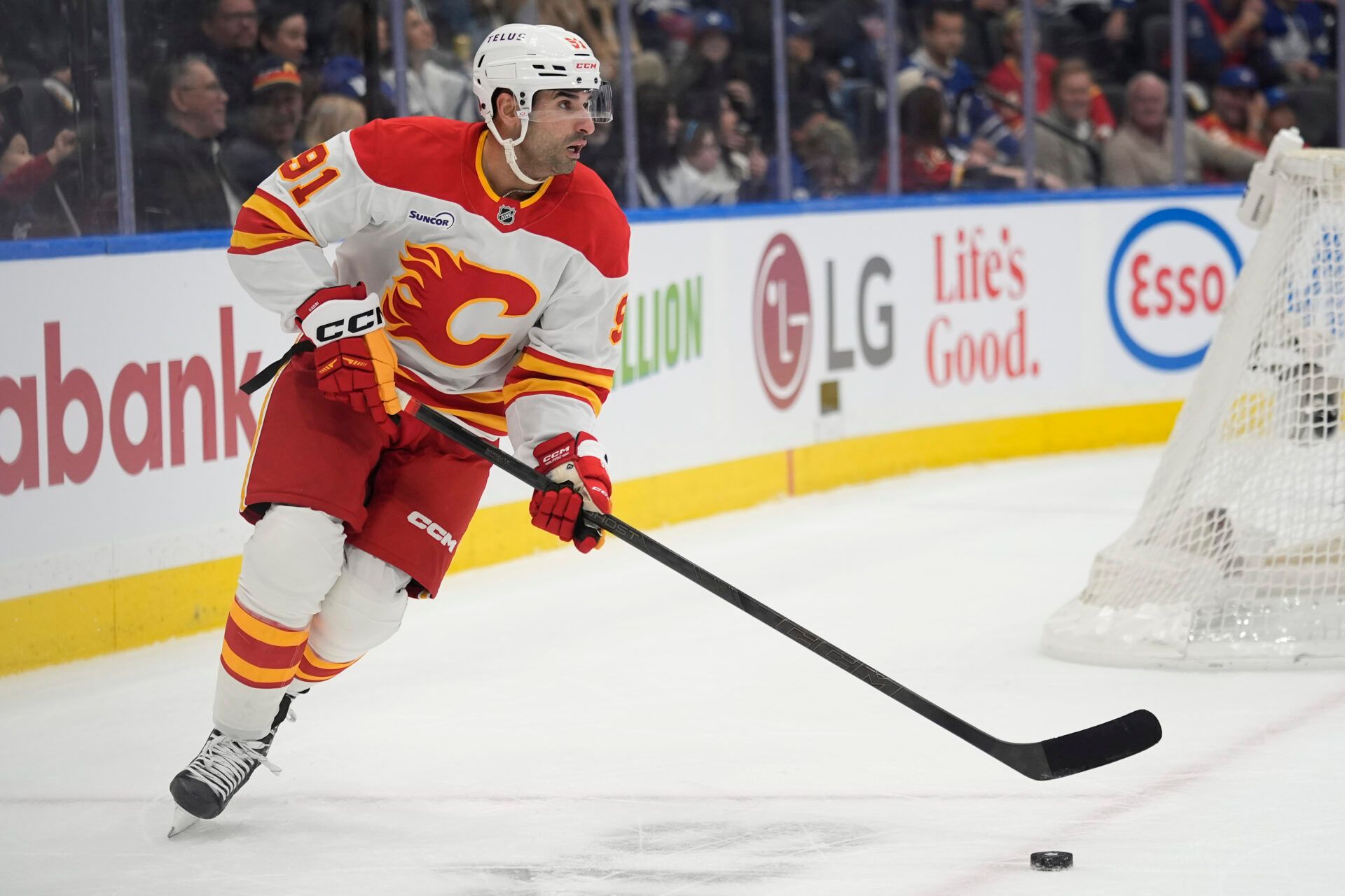 Calgary Flames forward Nazem Kadri (91) carries the puck against the Toronto Maple Leafs during the first period at Scotiabank Arena.