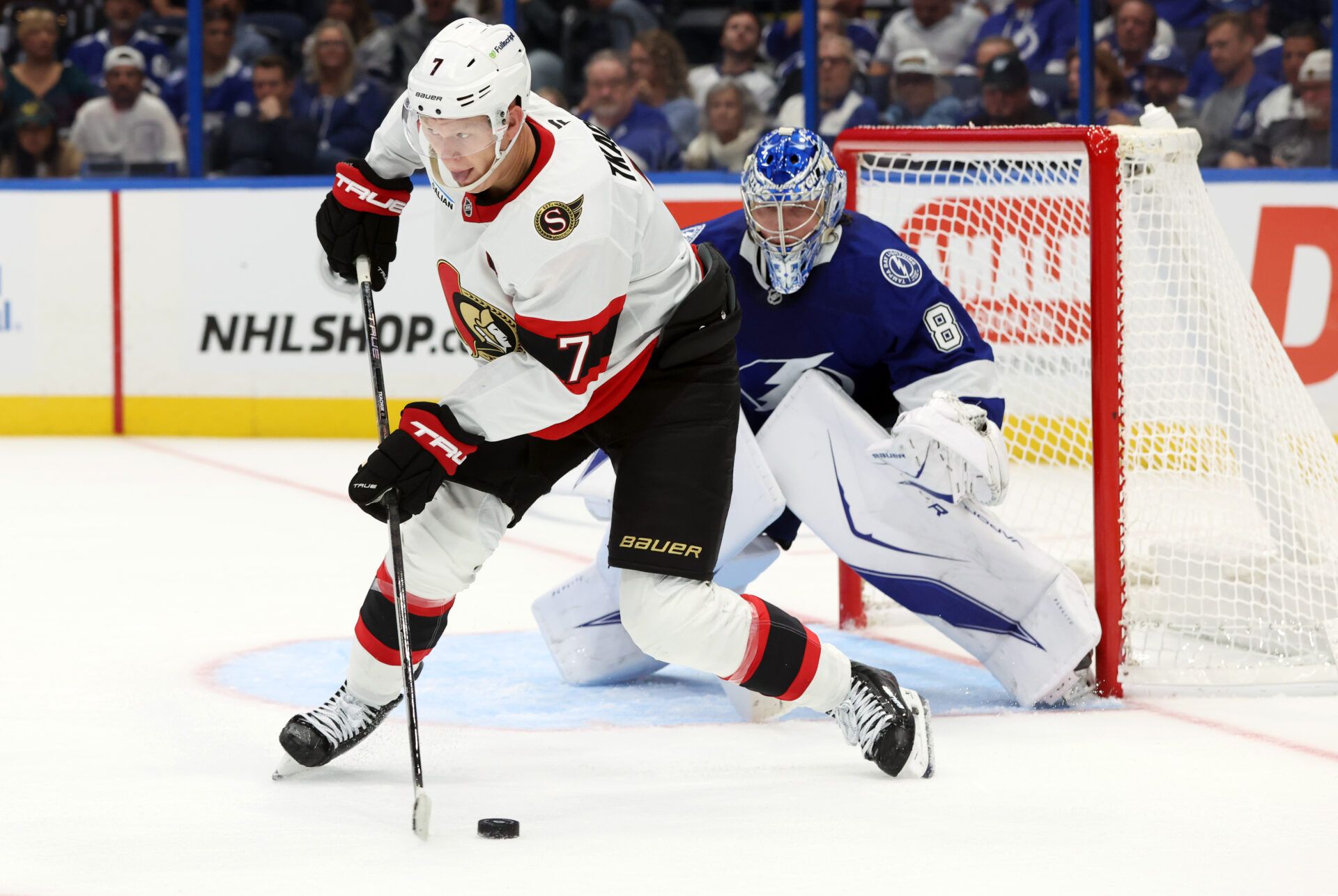 Ottawa Senators left wing Brady Tkachuk (7) skates with the puck in front of Tampa Bay Lightning goaltender Andrei Vasilevskiy (88) during the second period at Benchmark International Arena.