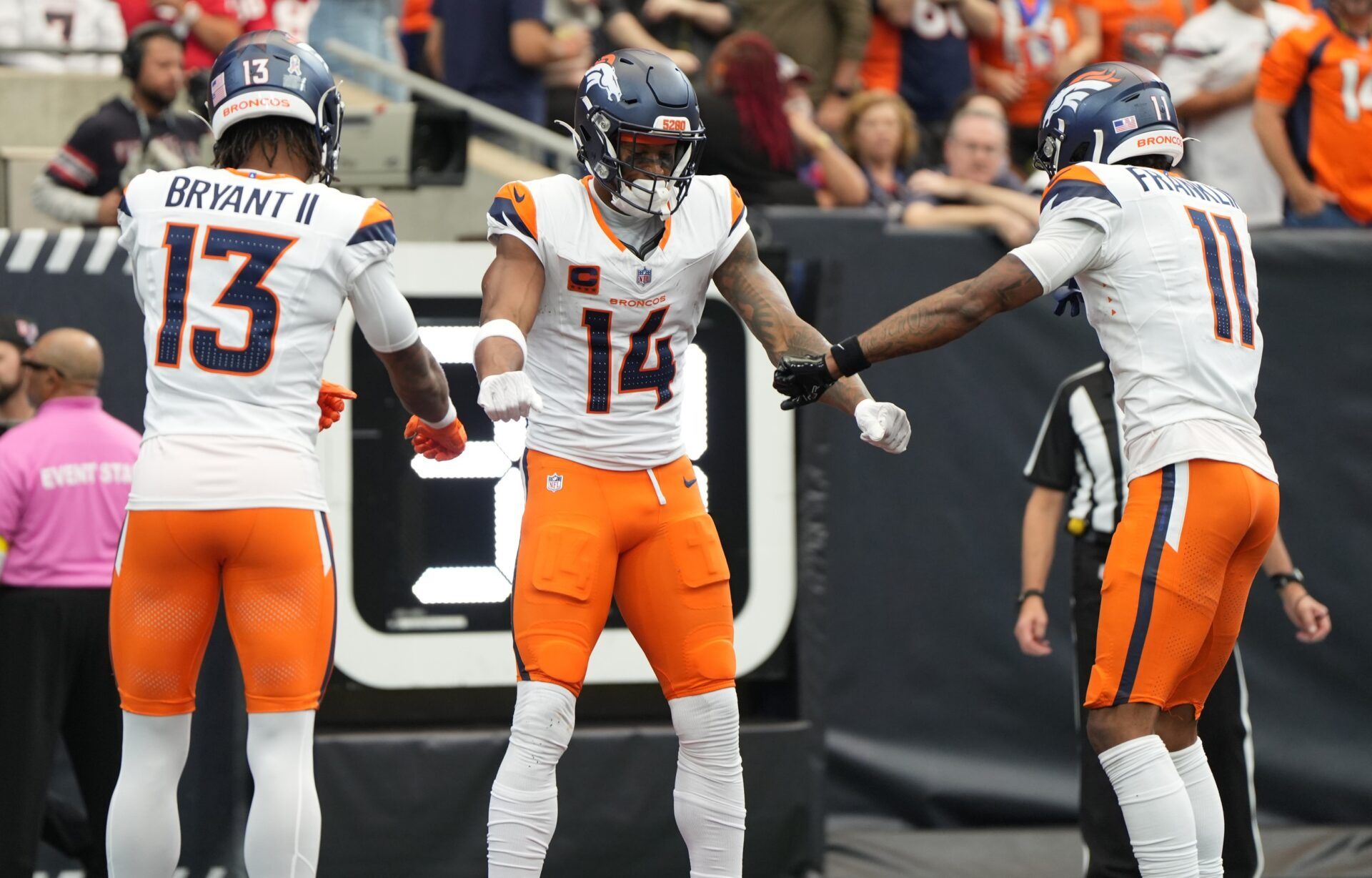 Denver Broncos wide receiver Courtland Sutton (14) celebrates with teammates after a play during the first half against the Houston Texans at NRG Stadium.