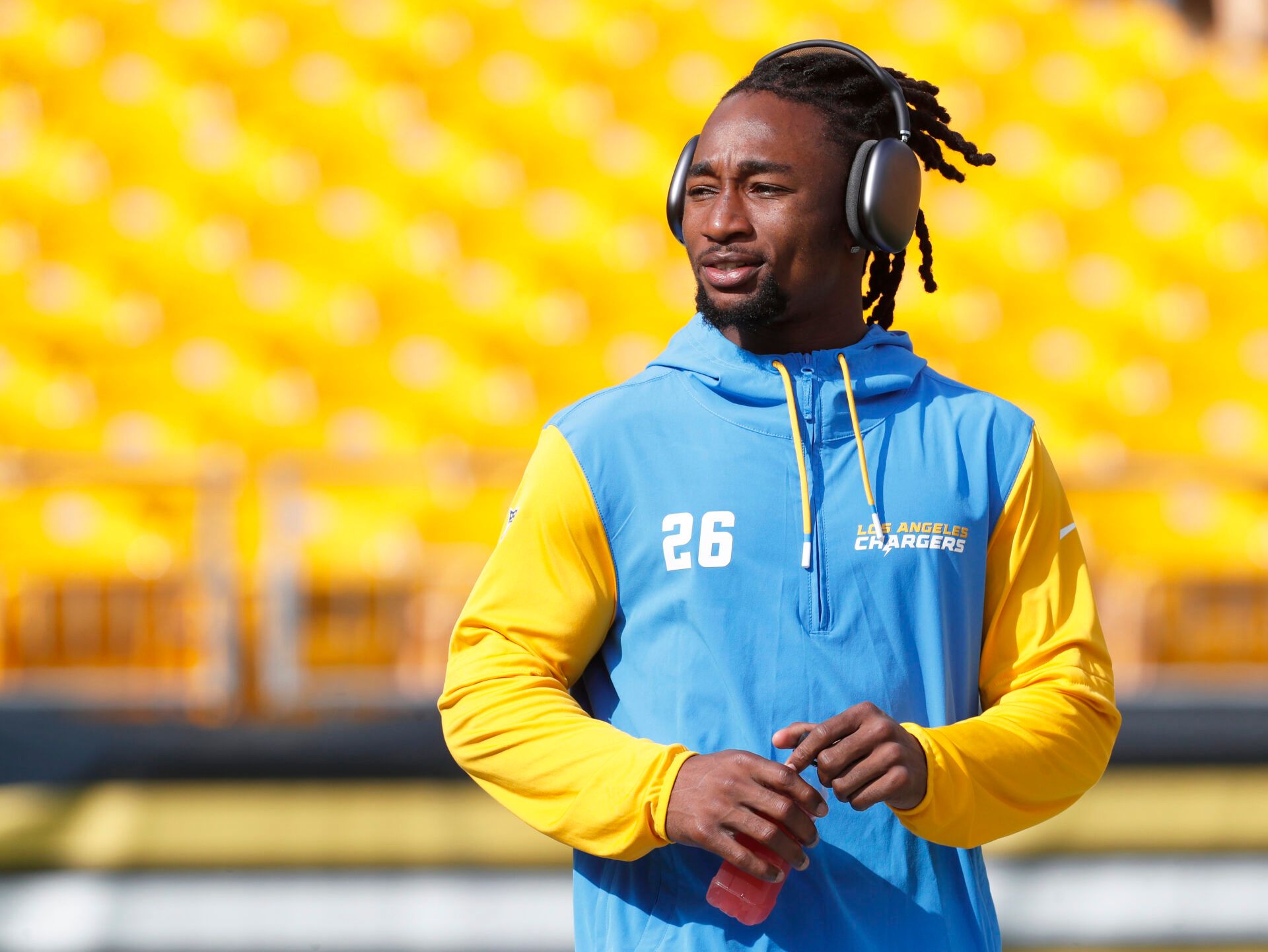 Los Angeles Chargers cornerback Asante Samuel Jr. (26) walks the field before playing the Pittsburgh Steelers at Acrisure Stadium.