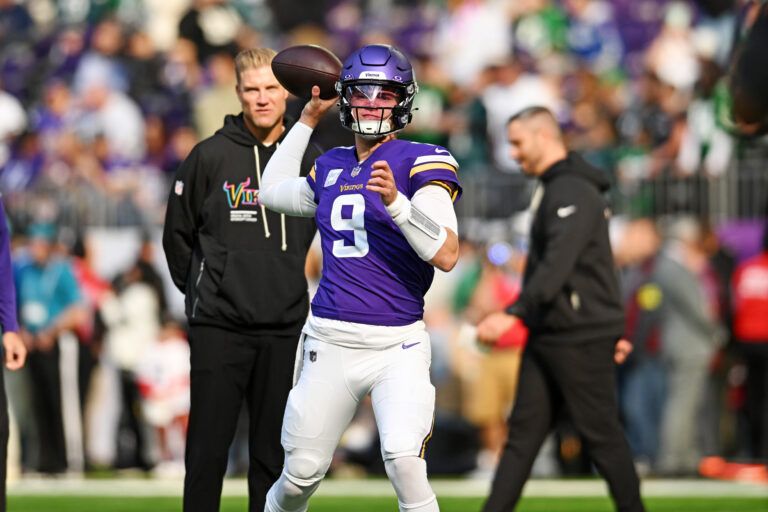 Minnesota Vikings quarterback J.J. McCarthy (9) throws a pass during warm ups before the game against the Philadelphia Eagles at U.S. Bank Stadium.