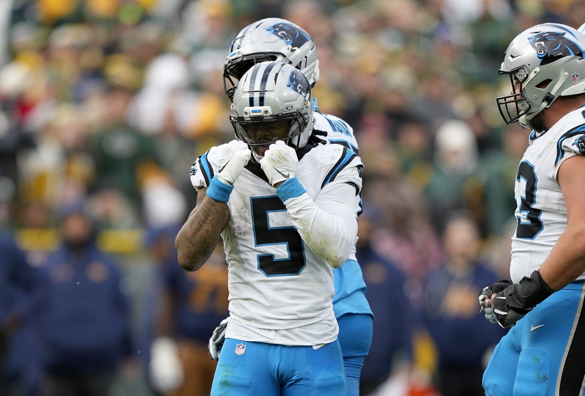 Carolina Panthers running back Rico Dowdle (5) celebrates after a first down against the Green Bay Packers during the second half at Lambeau Field.