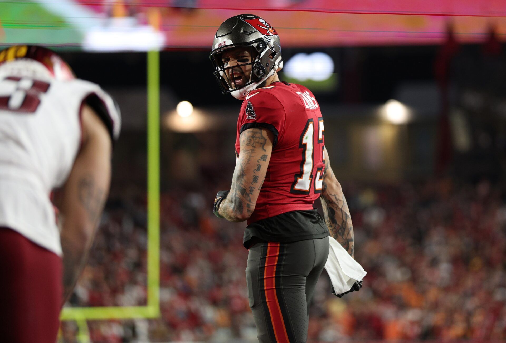 Tampa Bay Buccaneers wide receiver Mike Evans (13) reacts after a pass interference call during the second quarter of a NFC wild card playoff against the Washington Commanders at Raymond James Stadium.