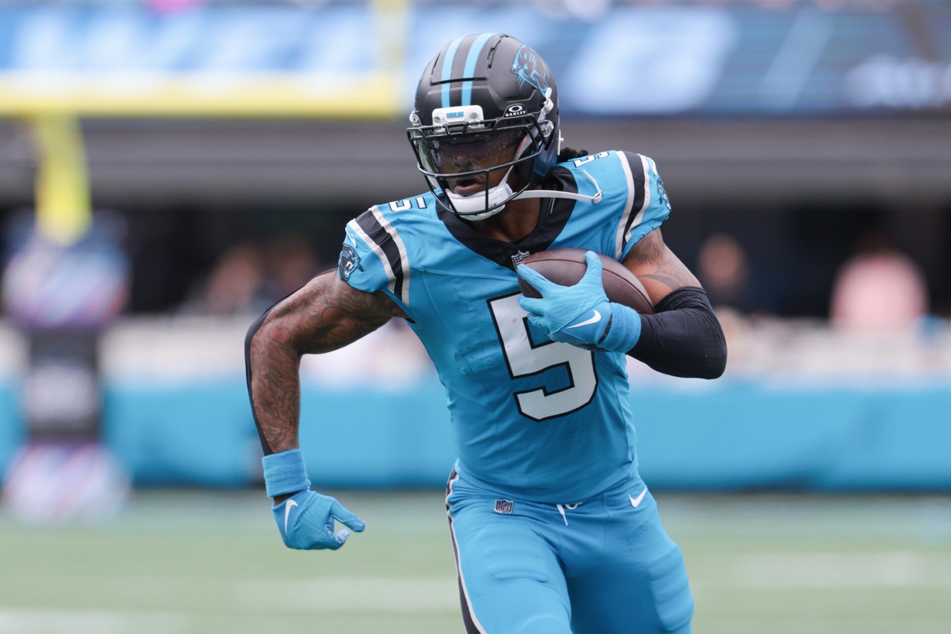 Carolina Panthers running back Rico Dowdle (5) runs with the ball during the second half against the Dallas Cowboys at Bank of America Stadium.