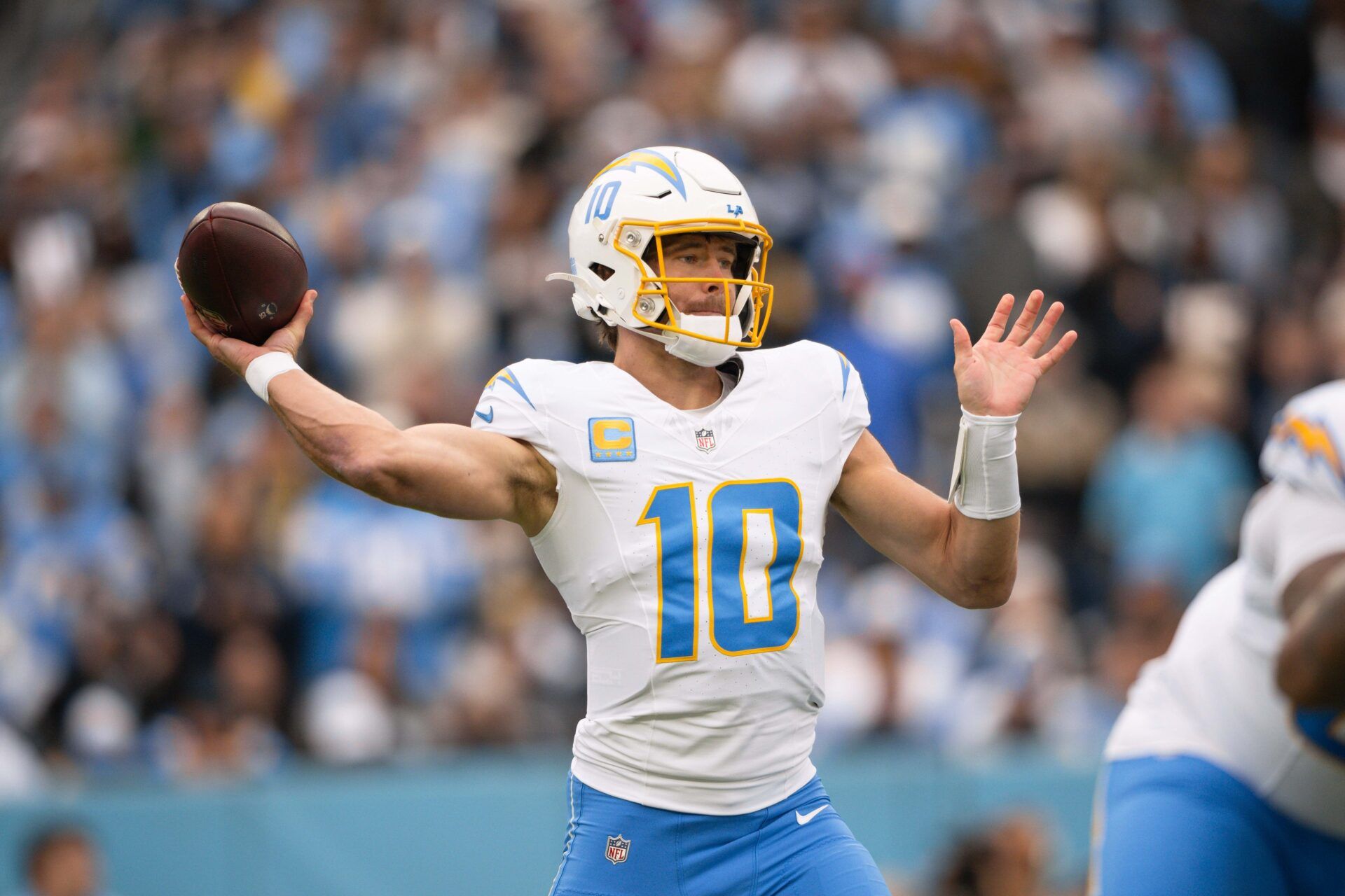 Los Angeles Chargers quarterback Justin Herbert (10) throws a pass against the Tennessee Titans during the first half at Nissan Stadium.