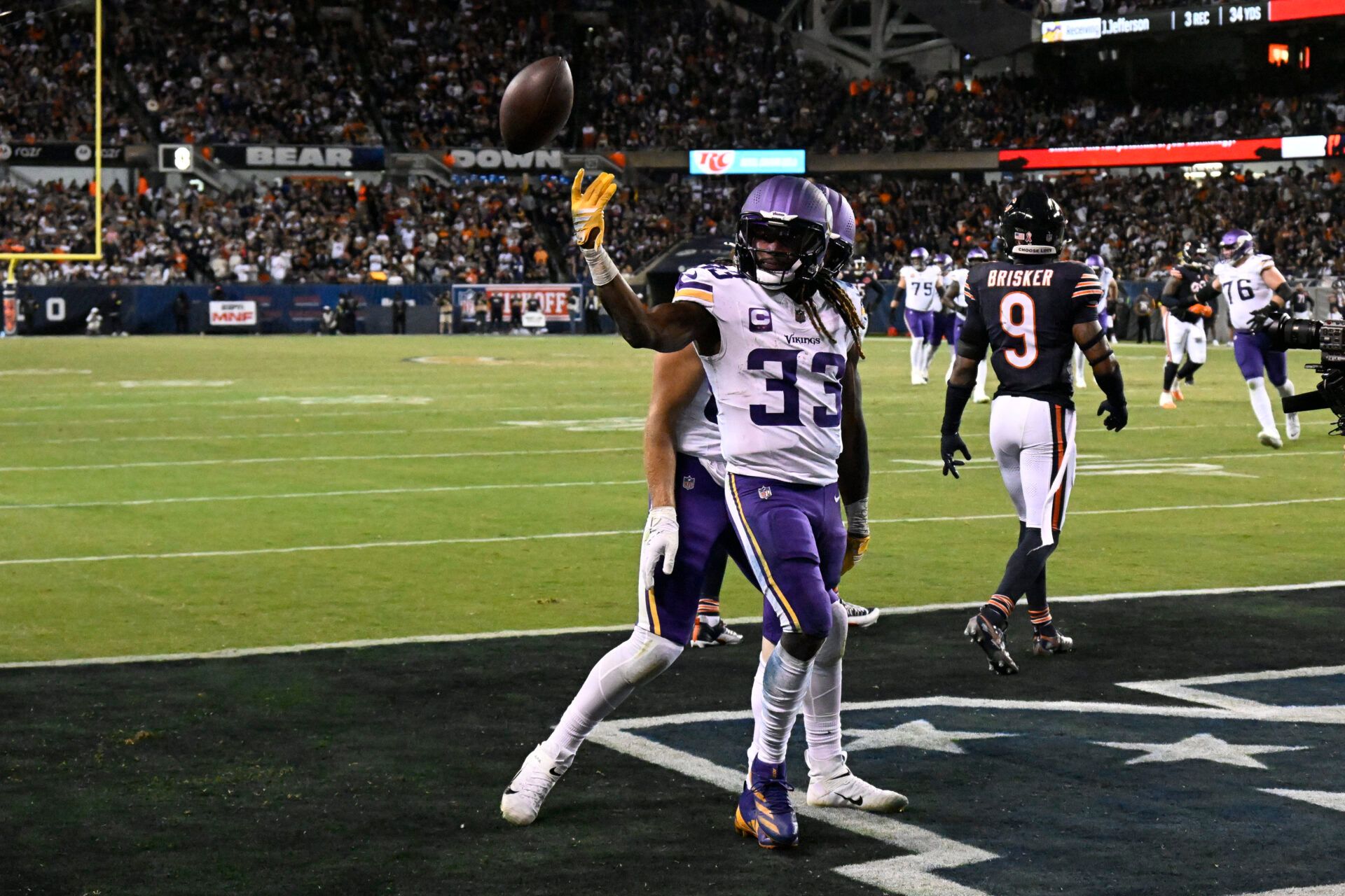 Minnesota Vikings running back Aaron Jones Sr. (33) reacts after a touchdown against the Chicago Bears during the second half at Soldier Field.