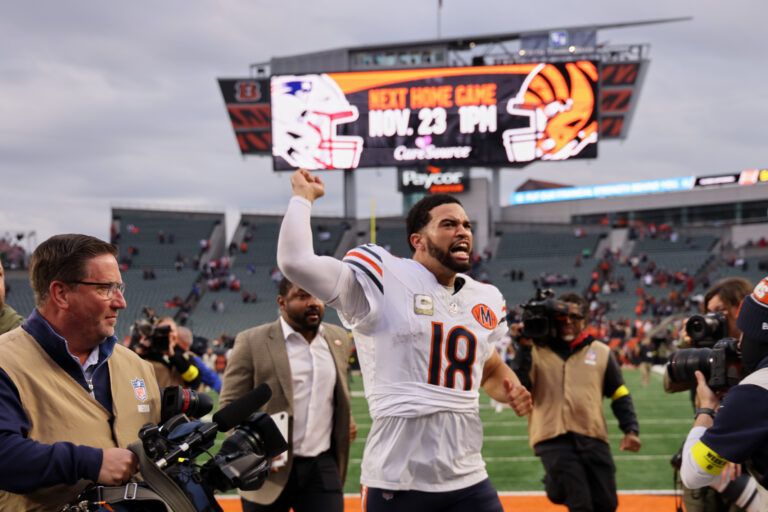 Chicago Bears quarterback Caleb Williams (18) acknowledges the crowd and walks off the field after defeating the Cincinnati Bengals in the fourth quarter at Paycor Stadium.
