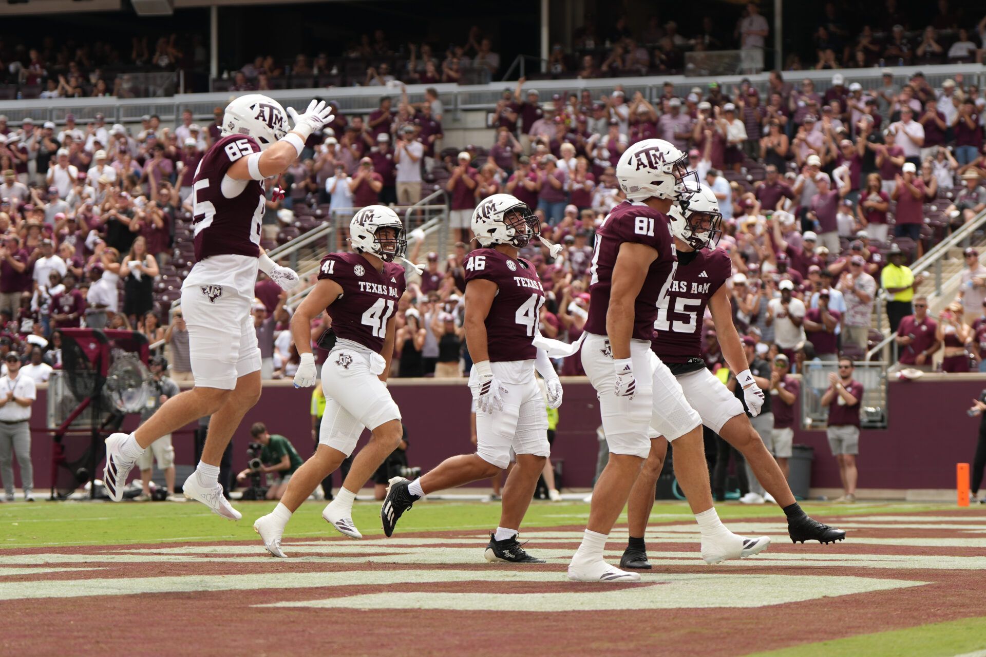 The Texas A&M Aggies ‘12th Man Kick-off Team’ celebrate after a tackle during the second half against the Utah State Aggies at Kyle Field.