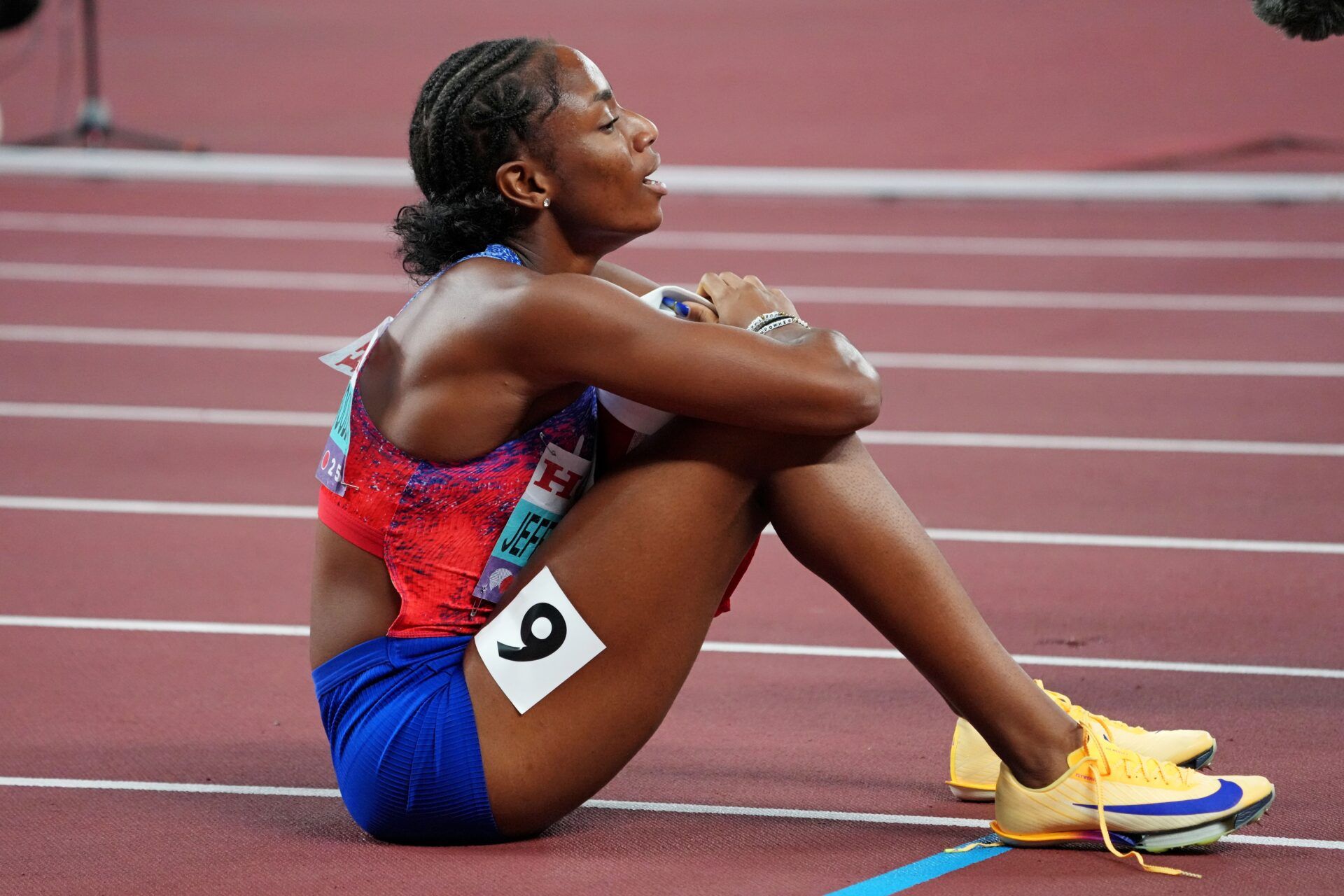 Melissa Jefferson-Wooden (USA) celebrates winning the gold medal in the womens 200m during the World Athletics Championships at National Stadium.