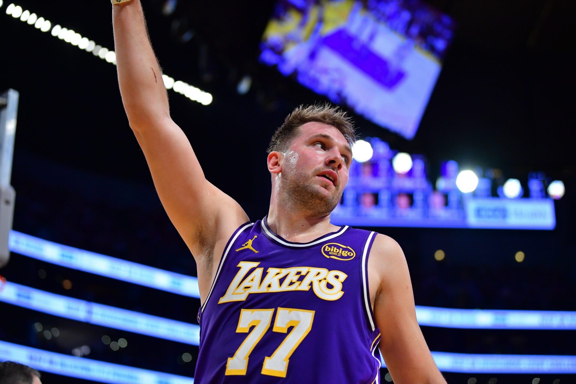 Los Angeles Lakers guard Luka Doncic (77) reacts after scoring the basket and drawing the foul against the San Antonio Spurs during the first half at Crypto.com Arena.