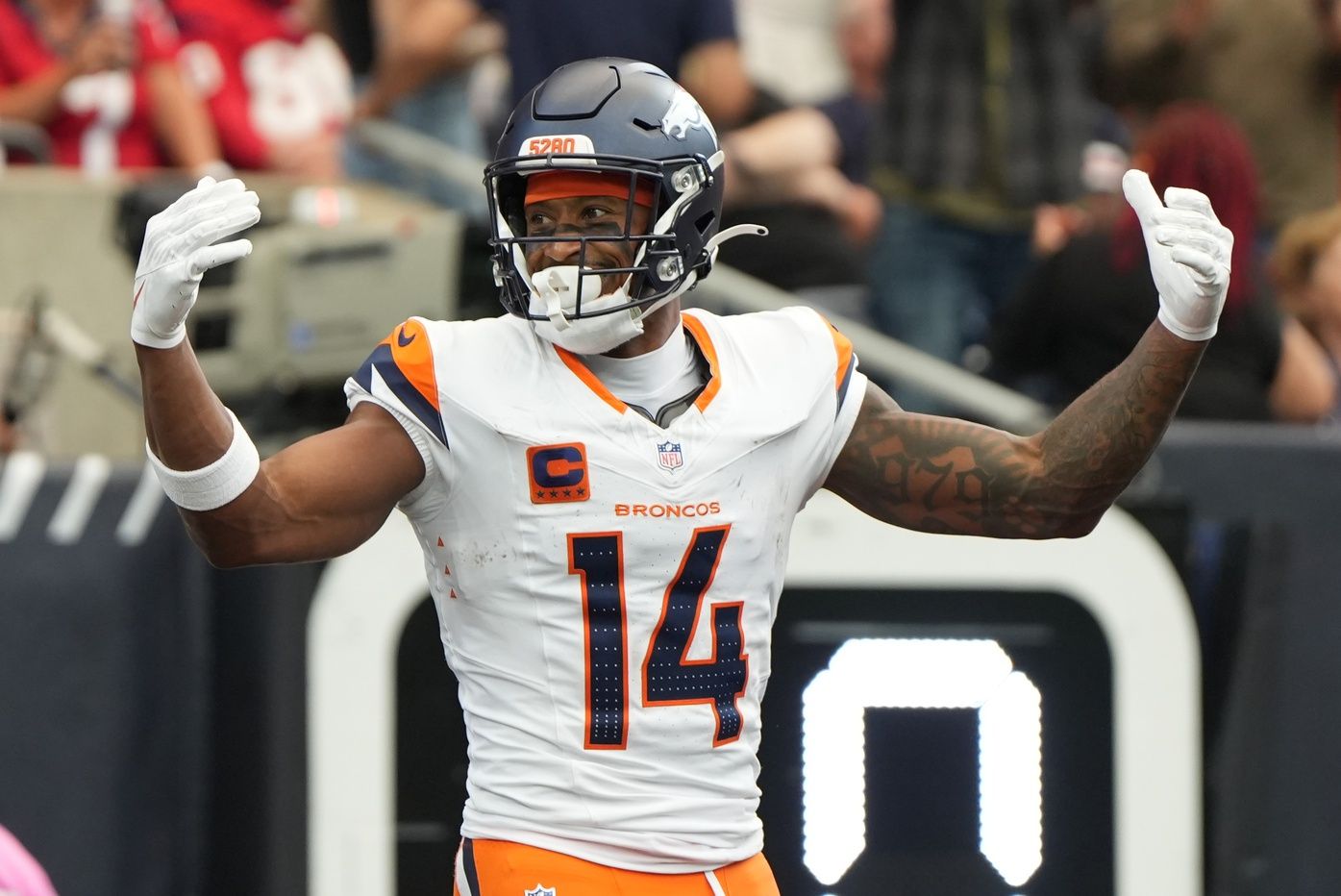 Denver Broncos wide receiver Courtland Sutton (14) celebrate after a play during the first half against the Houston Texans at NRG Stadium.