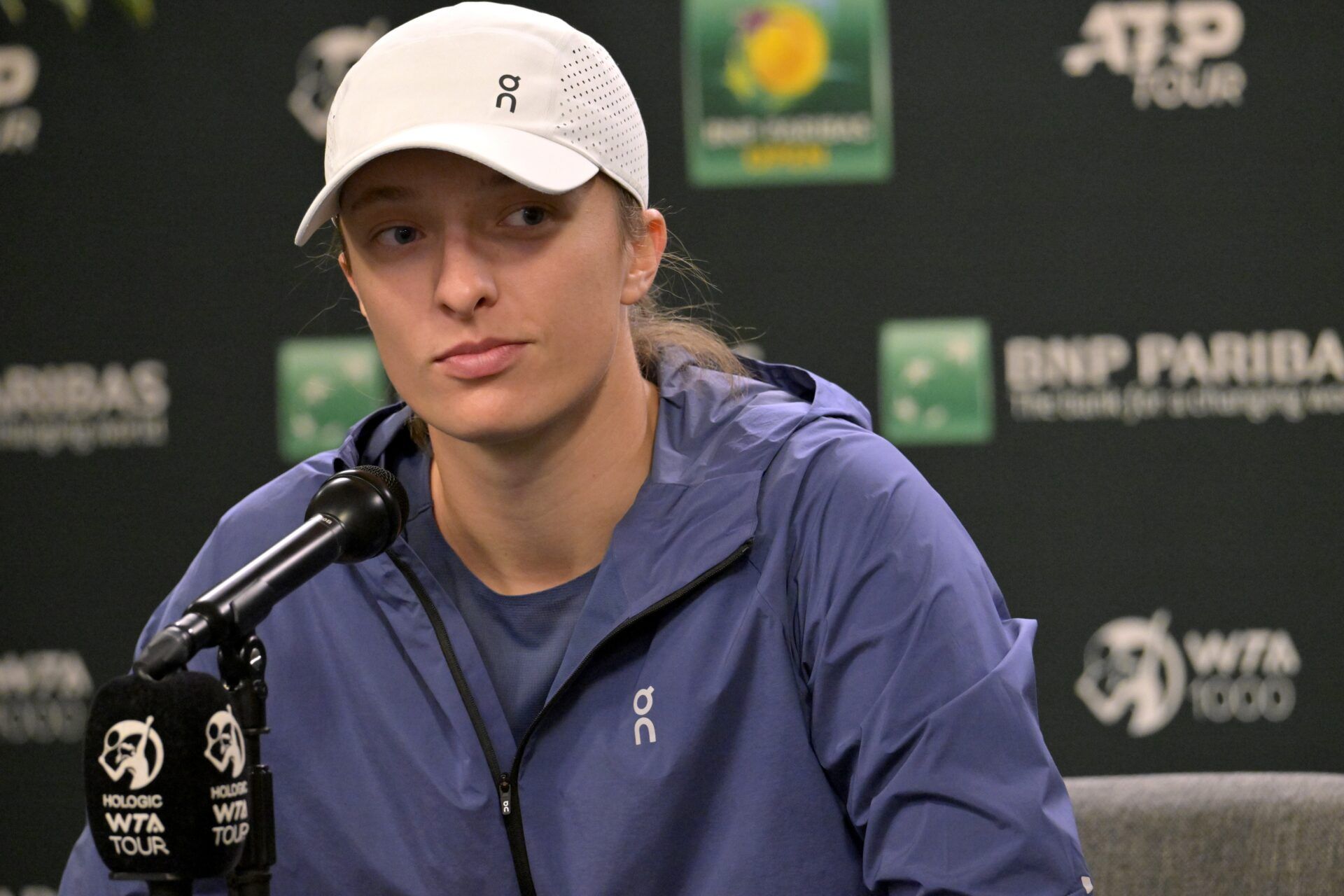 Iga Swiatek (POL) answers questions from the media during a press conference during the BNP Paribas Open at the Indian Wells Tennis Garden.