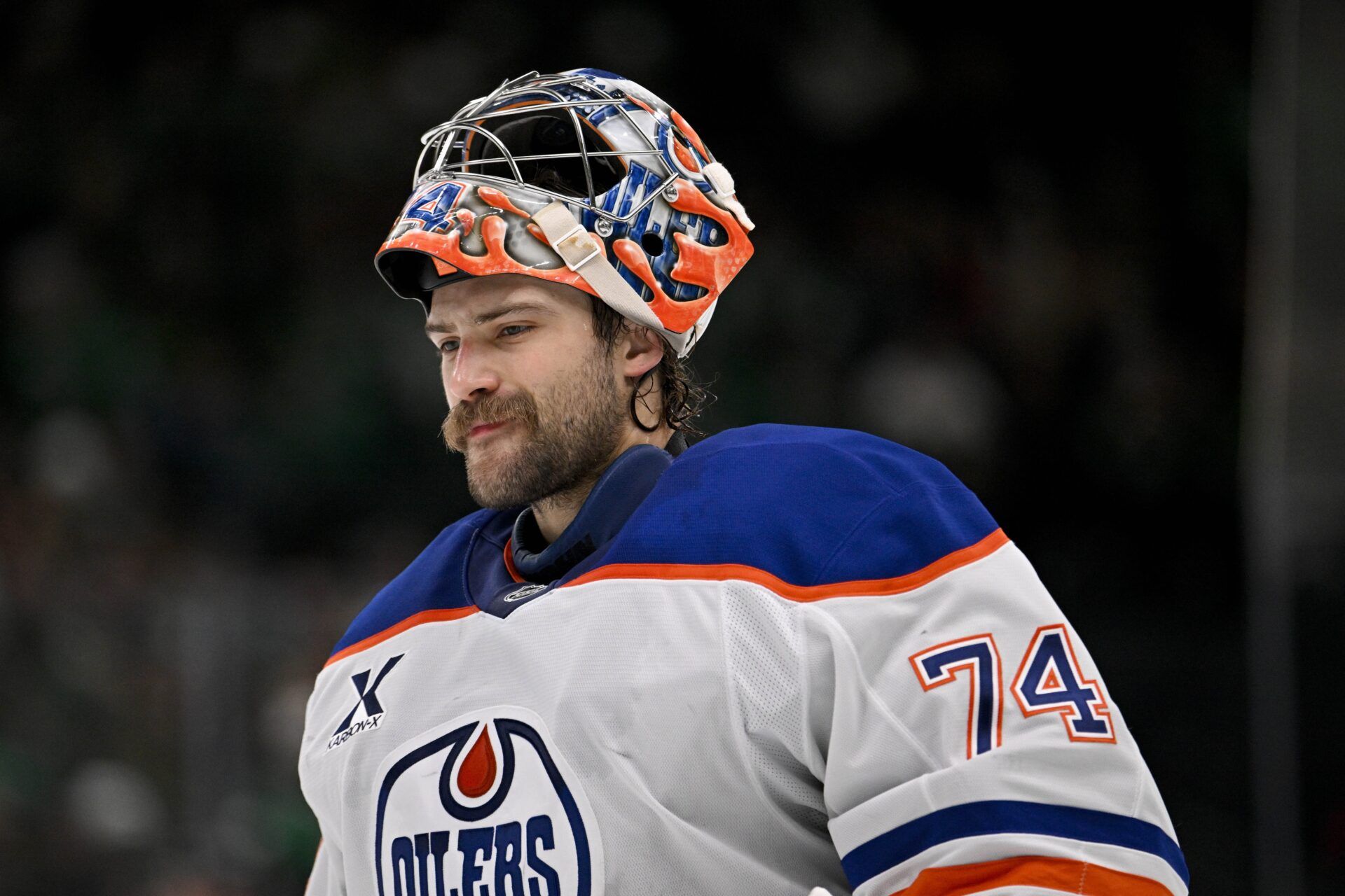 Edmonton Oilers goaltender Stuart Skinner (74) skates back on the ice during the overtime period against the Dallas Stars at the American Airlines Center.