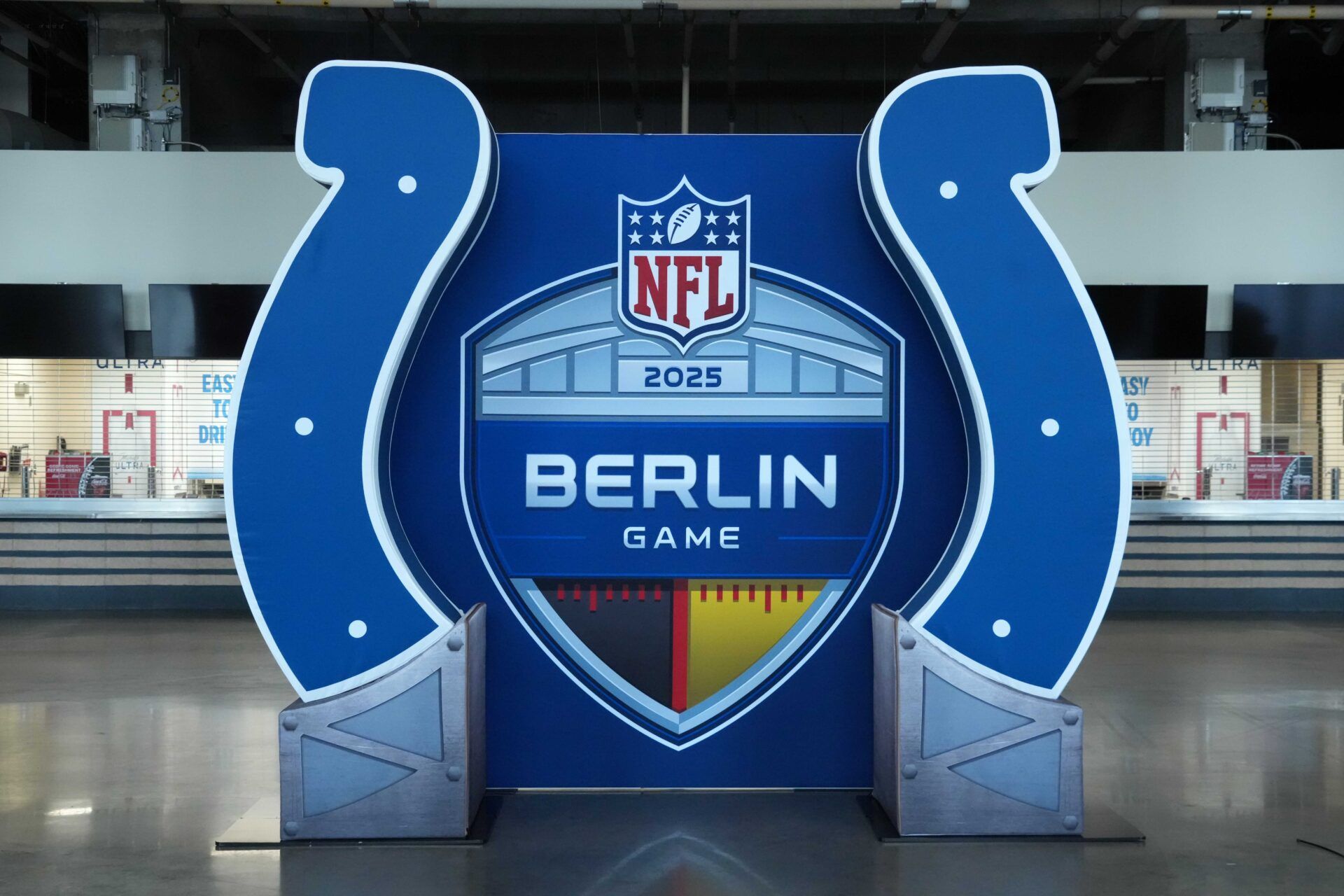 The 2025 NFL Berlin Game and Indianapolis Colts logo at Lucas Oil Stadium.