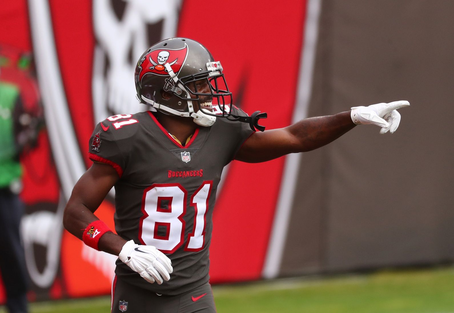 Tampa Bay Buccaneers wide receiver Antonio Brown (81) celebrates after scoring a touchdown against the Atlanta Falcons during the second quarter at Raymond James Stadium.